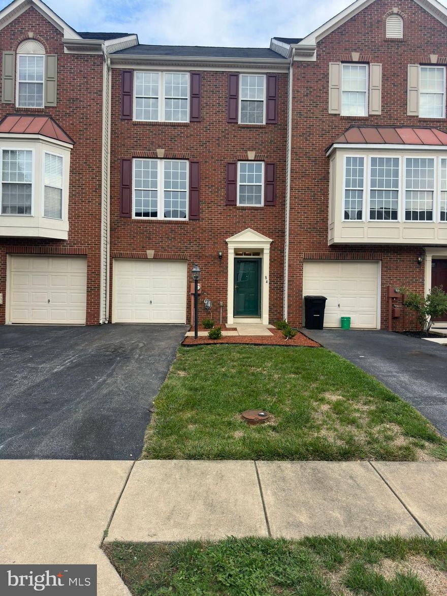 All about location. Minutes to Harpers Ferry, nearby shopping centers, downtown Charles Town, and nearby commuter routes to Virginia and Maryland! Featuring 3 bedroom, and 2.5 baths, this brick front townhome First thing you will notice is upon pulling up to this home is the beautiful brick front and 1 car garage. Heading up the steps to the main level you will see a large living room, well equipped kitchen including newer stainless steel appliances , dining room, and a morning room on the back.. Going up to the main level you will find the primary bedroom with cathedral ceilings, connecting to a private bathroom featuring a separate soaking tub and shower and double vanity. Down the hall you will fine two more bedrooms and a 2nd full bathroom. This home has had many updates recently including new floor, paint , range, dishwasher, microwave and newer hot water heater.  Schedule your showing today as this house will not last long.