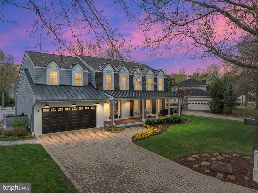 Annapolis Cove Gem with Custom Upgrades & Versatile Living Spaces

Welcome to 1277 Log Canoe Court, a beautifully updated home in the sought-after water-privileged community of Annapolis Cove. Just around the corner from the community marina, kayak racks, waterfront grill area, playground, and basketball court, this home offers an ideal location paired with thoughtful upgrades and flexible living spaces.

Inside, you'll find Brazilian Koa hardwood floors throughout the main and upper levels, creating a warm, rich tone throughout. The cozy den features a gas log fireplace, and the finished lower level includes luxury vinyl flooring, a spacious entertaining area and billiard space, and plumbing in place for a future beverage center. There’s plenty of storage, room for fitness equipment, and a separate space that works perfectly as a craft room or home office.

The layout includes four traditional bedrooms plus a versatile two-room suite over the garage with a full bath and private elevator running from the laundry room below to the garage level. This space is ideal for guests, extended family, home offices—or make it your primary suite, using the second room as a walk-in closet, nursery, or lounge. The elevator makes moving luggage, laundry, or groceries a breeze.

The covered back porch is a standout feature—designed with Trex decking, a gas fireplace, and a reclaimed wood ceiling—perfect for coffee in the morning, yoga, a cold plunge setup, or quiet evenings around the fire. It overlooks a large, level backyard with beautiful landscaping, irrigation, and a paver patio grill area. The charming front porch is the perfect place to unwind and take in the sunset. A spacious two-car garage completes the package.

Residents of Annapolis Cove also have the opportunity to join the Bay Ridge Pool just down the street—an added lifestyle perk that enhances this already amazing location.
The home includes a UV light water treatment system, and a pre-listing home inspection by Chesapeake HomePro is available upon request.