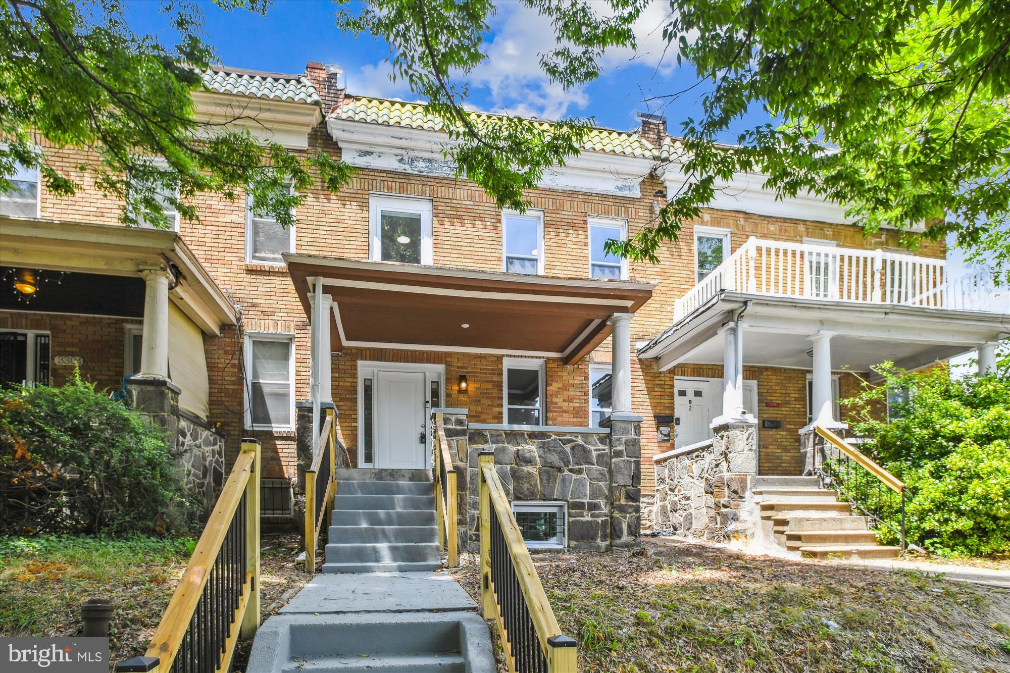Welcome to this stunning 4-bedroom, 2.5-bathroom home on a tree-lined street, near the Molly Mount neighborhood. This beautifully updated home spans three levels and boasts a host of modern upgrades completed in 2024, making it move-in ready for its next lucky owner. As you step inside, you'll be greeted by wood flooring that flows seamlessly throughout the main living areas and upper-level bedrooms. The heart of the home, the chefs-kitchen, shines with new shaker cabinets, sparkling white quartz countertops, an upgraded backsplash, a large deep sink, and top-of-the-line stainless steel appliances. The bathrooms have been meticulously updated with new vanities, hardware, sinks, faucets, mirrors, and luxurious custom tiles. Additional updates include a new HVAC system, new electric, LED recessed lighting, new windows, ensuring energy efficiency and comfort year-round. Driveway for parking for added convenience. Location is everything, and this home delivers! You'll be just minutes away from shopping, entertainment, major commuter routes, notable landmarks, and surrounded by nature. It’s a family-oriented community with lots of history and character. Don't miss out on this gem!