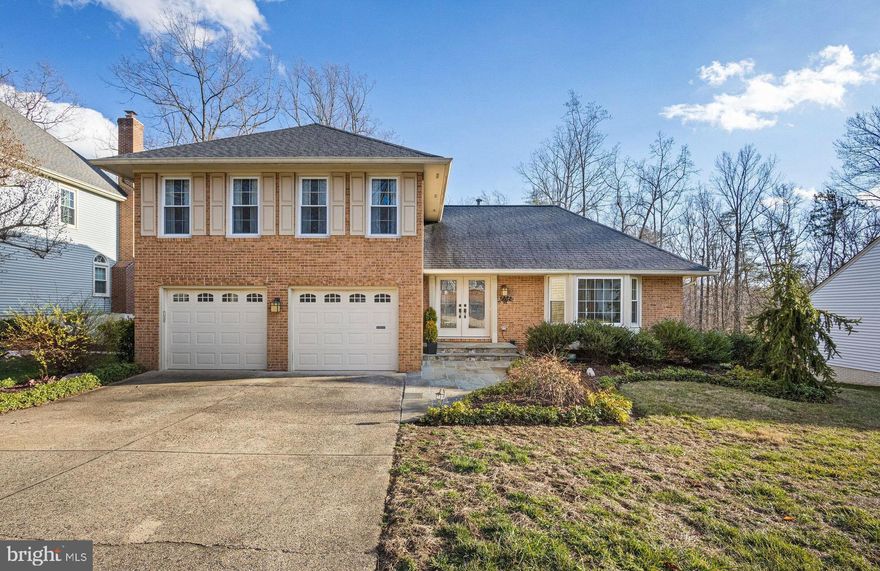 This home, located in very desirable South Run Forest, is completely move in ready! With almost $300k of updates and upgrades and approximately 3,700 sq ft of livable space, this 5 bedroom, 3.5 bathroom home will make everyone happy. **** The main level is perfect for entertaining with beautiful hardwood floors, two living rooms (one with a cozy wood-burning fireplace) -- a convenient powder room -- a separate dining room -- a gourmet white kitchen with stainless steel appliances (including a Thermador range with gas cooktop and electric oven,) wall of windows and skylight, and huge island all with stunning premium granite countertops -- leading to a spacious, low-maintenance Trex deck for all your guests to spill out into the big backyard with an adorable pond and outdoor fireplace! Walk to Lake Mercer out of your back gate. The mudroom houses laundry with a sink & dedicated folding space, has entrances from the oversized two car garage and a separate side entrance where a built in bench catches all daily living items as you arrive home. **** Upstairs there is an amazing primary suite with a huge, designer walk in closet (any shoe-lovers out there need space??) and zen spa bathroom (another skylight) with stand alone soaker tub, walk in shower, two separate vanities and storage. A beautifully updated hall bathroom with dual vanity and two spacious bedrooms round out that level. Brand new carpet in all bedrooms. **** The lower level includes a perfect hangout space with built ins and kitchenette, a full bathroom, two additional bedrooms, and an ideally appointed workout space complete with mirrors and tv. A sliding glass door leads directly into the backyard and a paver patio sheltered under the deck -- perfect for more entertaining or relaxing. This neighborhood is in the desirable Sangster Elementary / Lake Braddock school tier (always verify schools independently) and is close to multiple grocery stores, coffee shops, South Run Park and Rec Center (which has lots of membership or drop in options with an indoor pool, gym, tennis, racquetball court, playgrounds, walking trails to Burke Lake, dog park, indoor soccer, party space and also has a separate zipline course!) Convenient to multiple dining and retail options and easy commutes to Ft. Belvoir, NGA, Pentagon, National Landing, DC ... or work from home and enjoy your sanctuary of a house!