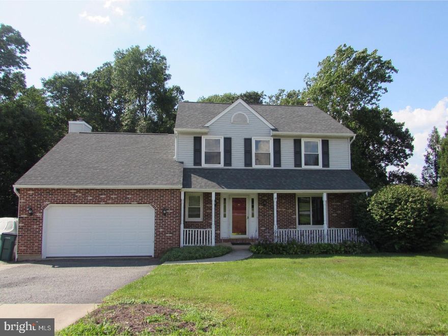 If you are looking for a neighborhood atmosphere with your own private wooded back yard, this is the home for you. This 3 BR, 2 full and 2 half bath colonial home is situated on two lots with a total of .89 acres of mostly wooded land.  (Parcels will transfer together with the sale) Upon entering this home you are greeted by a two story entry way which leads to the hall bath and bright living room with southern exposure.  The dining room features a chair rail and laminate wood flooring that extends into the eat in kitchen with an island and oak cabinetry.  All appliances will be included with the home. The family room, with gas fireplace, leads to the deck overlooking the quiet wooded back yard.  Listen to the sounds of nature as you enjoy your morning coffee or a family meal.  The main level of this home also includes a laundry room and two car garage with brand new garage door.  (To be installed on July 10th) Upstairs features three bedrooms and two full baths with tile flooring.  The master bedroom has an ample walk in closet and on suite full bath.  The walk out basement is partially finished with an additional gas fireplace, recreational room and pool table area.  This level also houses a storage area and 1/2 bath.  Additional features include: replacement windows with life time warranty, new garage door,  newer roof and gutters, access to a stream from the back wooded lot, central air conditioning and economical gas heating and hot water.  Schedule your private showing today!
