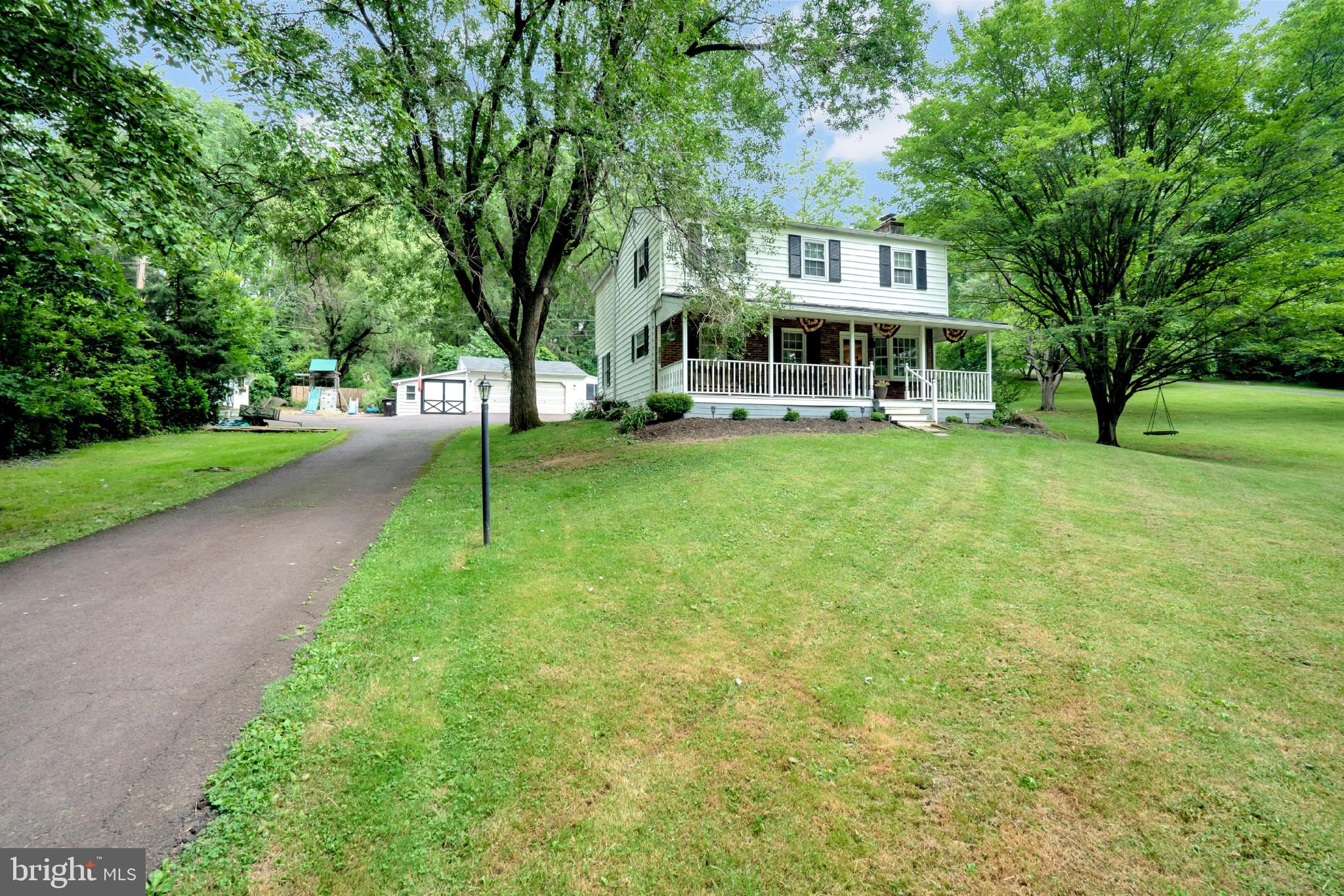 Welcome home to this warm, cozy  environment!  This home presents with a full length front porch and back patio for entertainment.   The three car garage has lots of storage and has a side screened room used as an outdoor bar area.   Beside the garage you can provide evening entertainment with a graveled firepit.  In addition to all these outdoor perks you have a  large storage shed.  As you enter the home from the welcoming front porch you find  an open floor plan which includes a living room with a wood burning fireplace and bay window.  The kitchen has been completely remodeled with new lighting and granite counter tops.  The kitchen leads into a dining area, family room and 1/2 bath.  Upstairs you will find a large master bedroom with walk-in, tiled shower and separately zoned heating & cooling.  There are three other spacious bedrooms and full bath.    Showing  Start 7/30/2020.