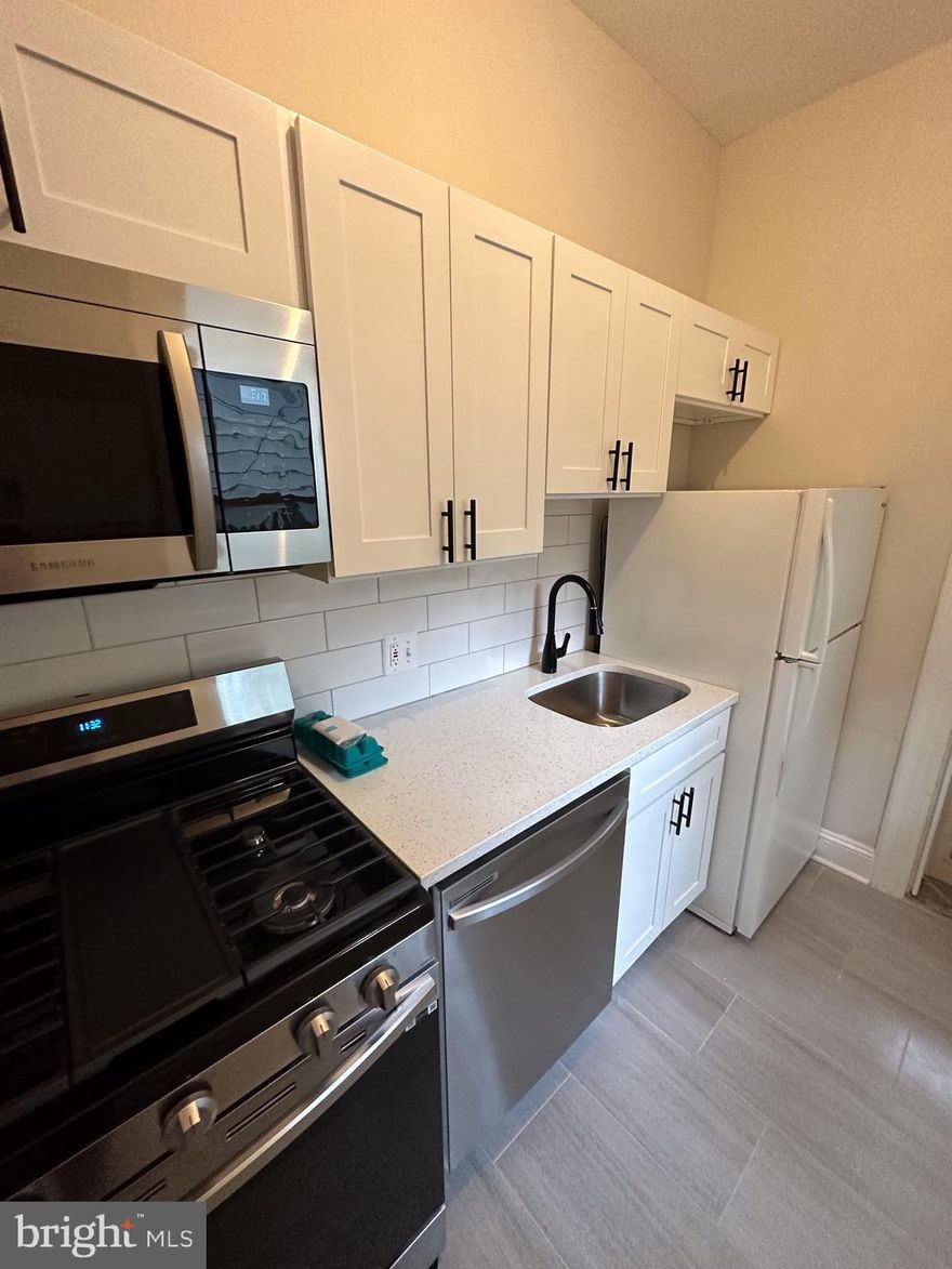 Welcome home to 4006 Roland Ave. This incredibly spacious 2 bed 1 bath renovated apartment features quartz countertops, in-unit laundry, Central AC, Lots of natural light, as well as a bonus 3-season sunroom! 

Just a short walk down the street to the shops and restaurants of 36th street of Hampden. 

This modern and spacious living space is located walking distance to JH Homewood campus and the Rotunda shopping center. Don't miss it!