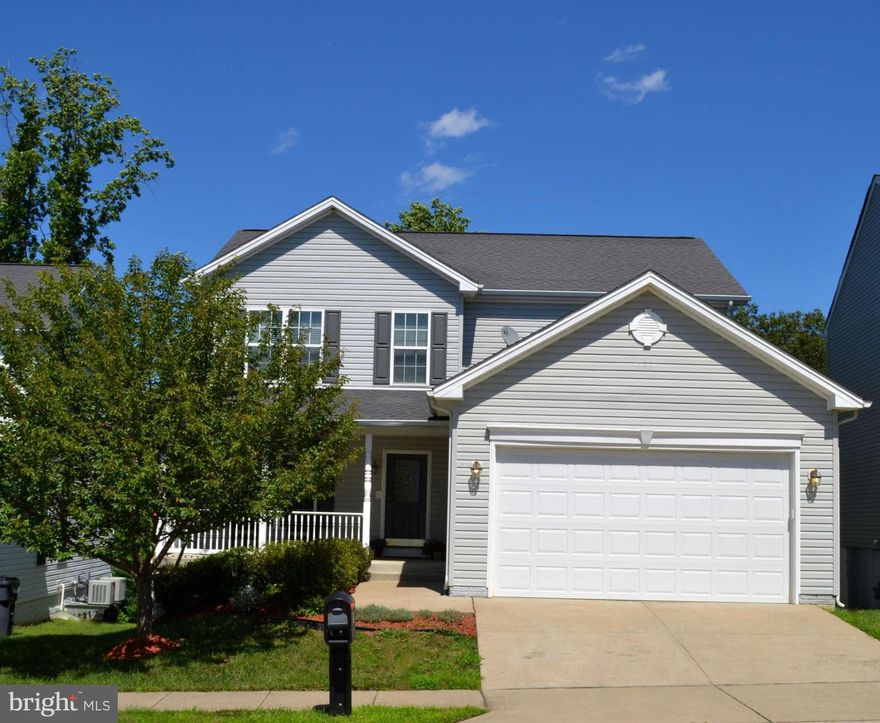 Sidewalk, gated community w/amenities. Home shows like a model. Private, wooded, fenced backyard.  FR w/ beautiful corner stone fireplace. Liv Rm/Study has wood floor, DR w/wood floor, crown/chair molding. Kitchen w/break nook, center island. Lux Mstr Suite has jet tub, sep shower. Walkout basement has large recreation room w/sliding glass door. Minutes to Quantico, I-95, RT 1, RT 610 and VRE.