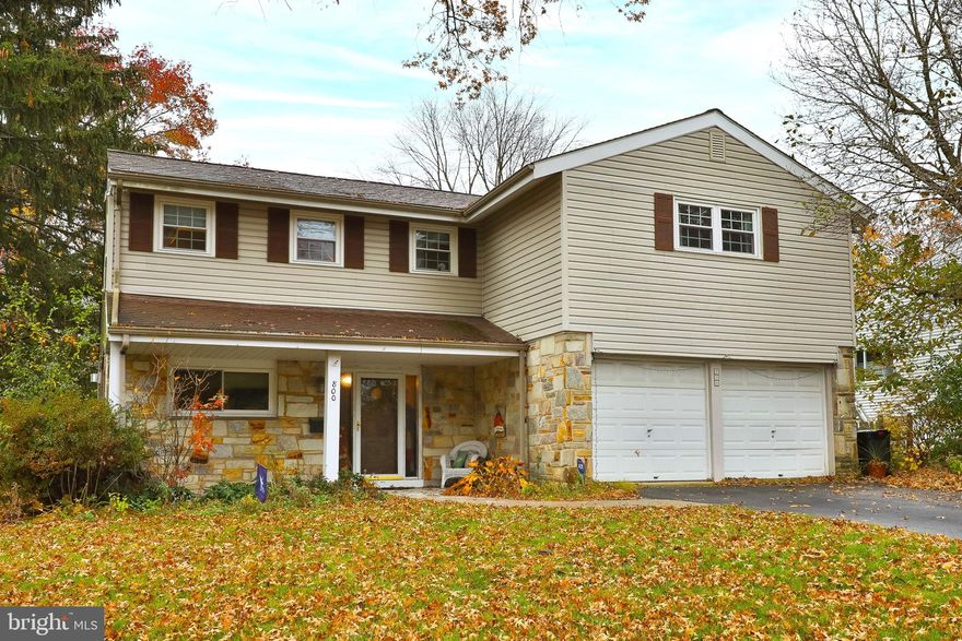 Welcome to 800 Preston Road, a charming residence nestled in the heart of Erdenheim, PA. This home features 4 bedrooms and 2.5 bathrooms and is a colonial front to back split level.  When entering the home, the first thing you will notice is all the windows providing lots of natural light.  The front foyer has room for coats, shoes, and backpacks...ready for you to unpack the day. On your left is the home office with built in bookshelves providing a separate and quiet place to work or study. To the right is access to the laundry room, powder room, and garage. Continue up a few stairs to the open concept living room and dining room with gas fireplace and backyard views. The eat in kitchen is neutral and bright, with updated appliances, cabinets, and countertops. Sit and enjoy your coffee while enjoying nature views in your own backyard. On the second floor, the main bedroom has an updated ensuite full bathroom and two nice sized closets. The other three bedrooms also have good closet space and share a full updated bathroom in the hallway. Two nice extra features of this level, a laundry chute and insulated extra storage space. The finished basement that is ground level(bright and with access to the backyard) provides more space to relax and includes an area for mechanicals and more storage. In the backyard you'll find a deck and lots of space to play! Move right in to this friendly neighborhood in the Springfield School District. In this location, there is so much at your fingertips, including the shops and restaurants of Chestnut Hill, Wyndmoor, and Flourtown with a short ride on 309 to many grocery stores, retail locations, and more.