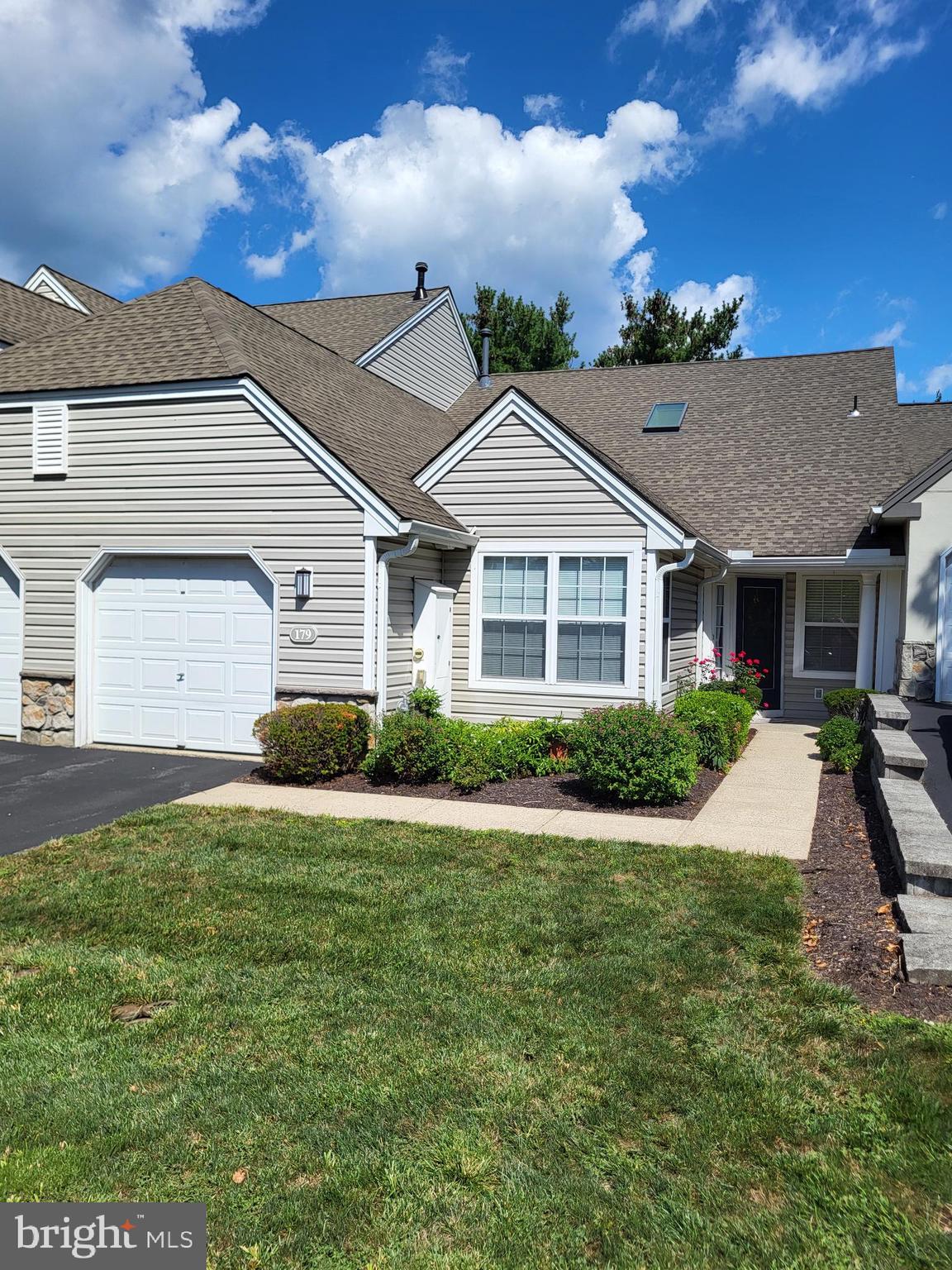 One-floor living at its best. Move right into this beautiful 2 Bedroom Townhome in Spring Ridge. This home features 2 Bedrooms, including a Primary Suite with full Bath and a large walk-in closet. Walk into the Foyer that opens to a gorgeous Living Room with beautiful wood flooring, vaulted ceilings, gas fireplace and French doors that open to a private Deck. Attached to the Living Room is a formal Dining Room. The Kitchen features newer cabinetry, appliances and granite countertops. There is also a breakfast area for casual dining. A second full Bath and Laundry Room complete the first floor. One Car Garage included. This home has been updated with a new roof (2014), new Kitchen and new flooring. Monthly Association Fee includes lawn & landscaping, snow and trash removal, and membership in our beautiful community Pool. Conveniently located Spring Ridge is close to shopping, schools, medical facilities and major highways.