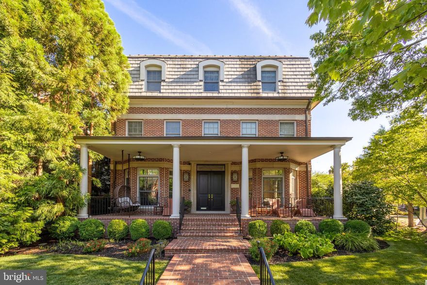 A rare opportunity awaits with this magnificent 7-bedroom, 7 full bath, 2 half bath residence featuring an elevator, 2-car heated garage, au pair suite and outdoor oasis on a sprawling corner lot in Woodley Park. The home has been freshly painted and the virtually staged photos showcase the possibilities that this stunning property offers. Spanning nearly 8000 square feet across 4 levels, this residence was built by the acclaimed Zuckerman Builders and embodies the epitome of luxury living. As you approach, lush landscaped grounds and inviting stairs lead up to a spacious front porch with a charming swing, setting the tone for the grandeur within. Upon entering, sunlight floods the formal living room, adorned with a wood-burning fireplace, while the adjacent formal dining room echoes elegance with its own fireplace and ample natural light. The chef’s kitchen features bright white cabinetry, granite countertops, stainless steel appliances, and a spacious island. Continuing through the main level, a gorgeous living room awaits, boasting a wood-burning fireplace, unique tray ceiling design, and double French doors opening to the meticulously maintained backyard oasis. Here, enjoy patio seating, a built-in gas grill, and a lush grass turf area bordered by tall trees and a brick wall for ultimate privacy. There is also a water fountain against the brick wall adding to the tranquility and ambiance of the outdoor space. Ascend the elevator or staircase to the second level, where four spacious bedrooms each boast en-suite baths and walk-in closets. The first of two laundry rooms is also on this floor. The third level unveils a full-level primary suite, complete with dual bathrooms, two expansive dressing rooms, and an office/sitting room that could also be used as a bedroom. The entertainer's basement beckons with a recreational area, wet bar setup with wine fridge, ice maker and sink, and a full in-law or au pair suite featuring a kitchen, full pantry, bedroom, full bathroom, half bathroom and laundry room, along with additional space that is currently being used as a home gym. The home boasts a 2-car heated garage and a driveway, which is conveniently situated on the street rather than in the alleyway, providing additional off-street parking. Experience seamless multimedia integration with televisions, audio in every room, and full lighting control through the cutting-edge Control4 smart home system. Situated in the prestigious Woodley Park neighborhood, this property offers unparalleled accessibility, with the convenience of being within walking distance to Wisconsin Ave, Connecticut Ave, and Massachusetts Ave. The area is rich in history and elegance, with easy access to the iconic Washington National Cathedral, adding a touch of timeless grandeur to the surroundings. Located right across the street from the Maret School and offers close proximity to several additional private schools such as National Cathedral School (NCS), St. Albans, and Beauvoir Elementary School, as well as access to nearby public schools including Stoddert Elementary School. Residents can also enjoy the nearby Rock Creek Park and the Tregaron Conservancy, making it an ideal hub for exploring the city. This Woodley Park gem epitomizes a lifestyle of luxury and convenience, offering a seamless blend of elegance and practicality. Schedule a showing today to experience the best of this vibrant and historically rich neighborhood.