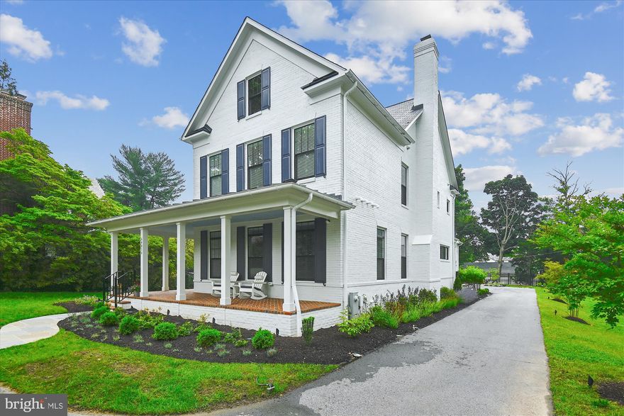 The house you have been waiting for in one of Baltimore's coveted neighborhoods, Murray Hill. Modern farmhouse "chic' style custom built in 2020, this is basically a new house. The wrap-around porch and A-shaped gable roof line are reminiscent of nostalgic farmhouse style while the inside has modern clean comfort centric details which include a light neutral palette, an open floor plan, 10 ft ceiling heights, and generous amount of windows contributing to light filled rooms. No expense was spared on exterior features to include a synthetic slate roof, standing seam metal roof, Jeld-Wen windows, painted brick and Hardiplank siding. The main floor includes the front foyer, a nice sized home office, powder room, living room with woodburning fireplace, dining area and gourmet kitchen all with hardwood floors. The kitchen boasts high-end stainless steel appliances, Sub-Zero, Wolf 8 burner commercial grade gas range with double ovens, custom range hood, Bosch dishwasher, Wolf built-in microwave, oversized Kohler farmhouse sink and a large marble island. Kitchen flows to the wet bar which has a Sub-Zero under counter wine cooler, stainless steel sink, and double door pantry. The mudroom is what dreams are made of. Built-in bench and 5 locker style cubbies. Entrance from back hall to expansive au-pair suite upstairs with full bath. 2nd floor has 4 bedrooms with 4 full en-suite Baths and a designated laundry room. 5th bedroom on 3rd floor with full bath. The baths are all tastefully finished with custom tile, Kohler sinks and high-end fixtures. The finished lower level has a huge family room with a full wet bar, wine room, a gym and storage area. The 3-car garage has epoxy floor finish, 3 overhead storage units, one motorized, a storage room and an exit to rear yard. Elevated brick patio off of the kitchen, and a custom built gas fire-pit with bluestone patio and bluestone capped seating wall, all add to your outdoor enjoyment along with a fully fenced-in yard. Professionally landscaped by Mullen Nursery and Maxalea. The sellers have added almost $200,000 in recent upgrades. New quality construction in such a desirable location close to highly rated schools, with an easy commute to downtown, walking distance to beloved local supermarket, Eddie’s, Starbucks and Dunkin’ Donuts make this house especially unique and special.