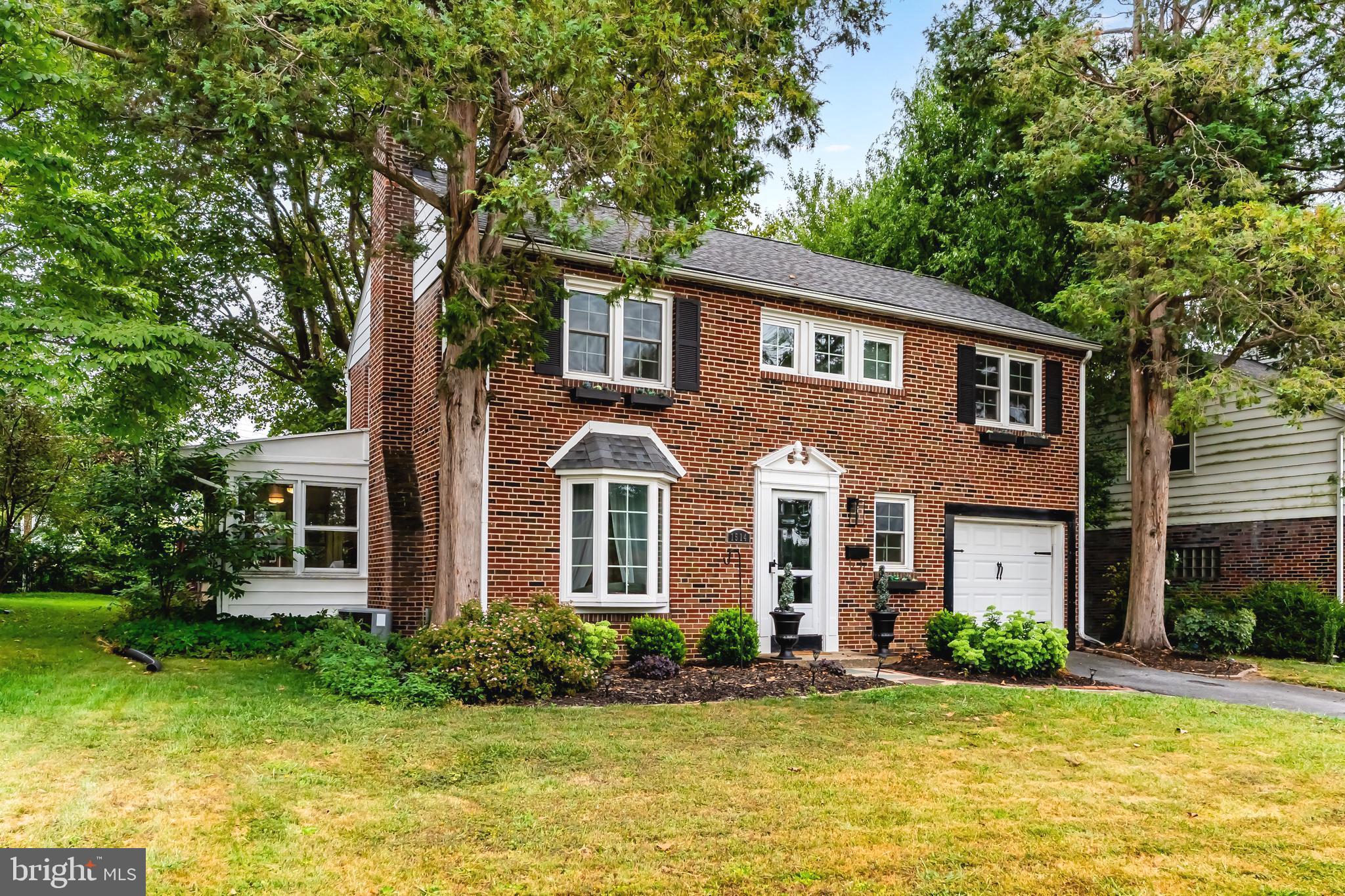 Highly desirable Highland Park community in the West Shore School District, Cedar Cliff High School. Over 2,100 square feet of beautifully finished living space in this exceptional two story, solid brick home. Window flower boxes, a slate walkway, and a fluted pediment create beautiful curb appeal. Fresh, crisp white paint, striking lighting fixtures, and gorgeous barnwood luxury vinyl plank flooring set a modern farmhouse tone. The painted brick fireplace with formal white mantle and bay window open to the formal dining room. The big showstopper, a remodeled kitchen boasting quartz countertops, stylish earth toned subway tile backsplash, white cabinetry, and stainless steel appliances featuring a gas stove and farmhouse sink with gooseneck pullout faucet. There is even a built-in wine rack, glass doors, and wainscoting to complete the look. A bright and inviting all season sunroom offers a perfect retreat to unwind, relax and rejuvenate. The second floor showcases generously sized bedrooms with gleaming hardwoods. The renovated bath has a quartz top with a rectangular under mount sink and oil rubbed bronze faucet. Glass tub/shower door and linen closet. The finished lower level includes a convenient half bath and is perfect for a rec room, game room, and/or home office. Additional highlights include energy-efficient gas heat and hot water and a new HVAC system. Refrigerator, washer and dryer included. Enjoy outdoor living in the fully fenced, level yard with canopy trees for shade, an expansive slate patio with an area for a firepit, and a storage shed. Located in a walkable neighborhood with integrated sidewalks, community parks, and convenient access to East and West Shore, I-83, I-581, I-81, and the PA Turnpike. This home is the perfect blend of timeless charm and modern updates. Call today for additional information or to schedule your own private showing.