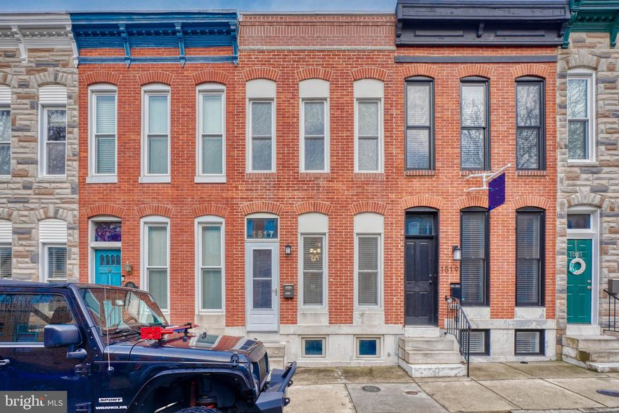 Spacious 2 bedroom brick front townhome with rear patio and 2-car parking! Home also features exposed brick, hardwood floors , skylights, large full bath with separate tub, storage in the basement and large bedrooms with lots of closet space! Great layout for roommates! Close proximity to Federal Hill attractions/restaurants and the stadiums.