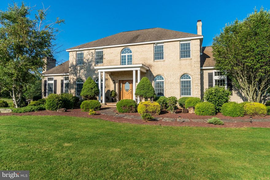 Welcome to 1490 Church Rd in Bushkill Township. When he first purchased the land, he was going to build his own house & develop the land & build houses. He and his wife fell in love with the magnificent view so the development never occurred. Here is your opportunity. A well-built colonial situated on the edge of 35.5 acres (plan available), with 974’ of road frontage waiting for a creative buyer. Move-in ready home freshly painted with new carpet and flooring. The main level family room has cathedral ceilings, a stone fireplace, & walls of windows, allowing you to appreciate the beauty of the mountain views. The master suite has huge walk-in closet/bonus space with skylights; a master bath with jetted tub, stall shower & double vanity. The 2-zone heat pumps with oil-fired hot water backup, are more efficient than electric backup. The huge basement has access to the garage and is ready for you to finish into additional living space and still have plenty of storage