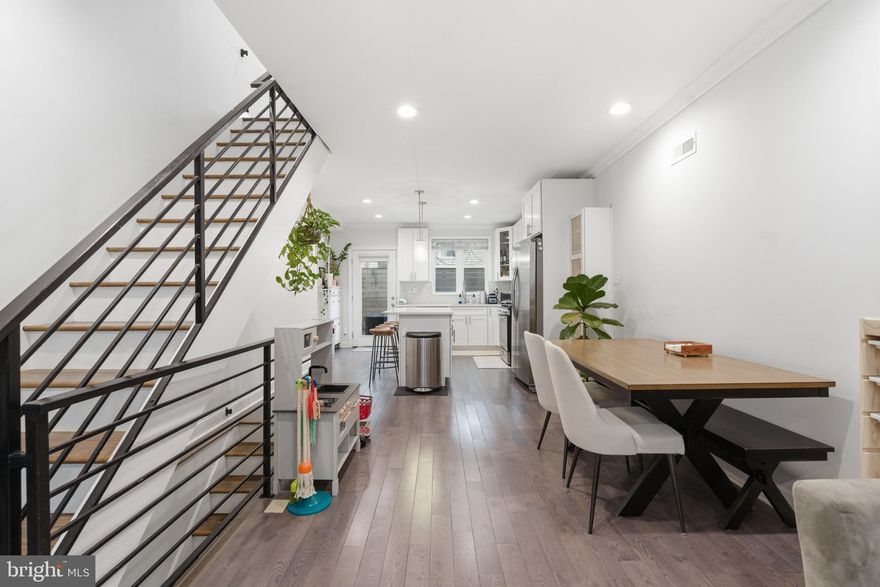 Welcome to the beautiful and recently new constructed home at 2734 Latona Street! There are 3 years remaining on the qualified tax abatement. This gorgeously updated 3-bedroom, 2.5-bath home sits on a quiet block in Grays Ferry and offers brand new finishes throughout. Step inside to an inviting open layout featuring rich hardwood floors and high ceilings. Lutron lighting throughout the home. The main level flows seamlessly from the dining area into a stylish kitchen complete with quartz countertops, a large island with bar seating and built-in microwave space, gas range, crisp white shaker cabinets, new dishwasher (2026), new garbage disposal (2025), and a full glass door leading to a private rear patio.

The second floor offers two generously sized bedrooms with ample closet space, along with a modern full bath featuring oversized subway tile and a spacious vanity. The entire third floor is dedicated to the primary suite, showcasing soaring ceilings, abundant natural light, a private balcony, and a spa-inspired ensuite bath room.

Topping it all off is a spacious fiberglass roof deck (redone in 2023) with sweeping Center City views—perfect for relaxing or entertaining. The fully finished basement provides additional living space, a half bath, and a separate laundry area .

This home also features all new electrical (200 amp), PEX plumbing, high-efficiency HVAC, roof, windows, and doors for low-maintenance living.

Conveniently located to local parks, restaurants, and transportation. With upgrades throughout and remaining tax abatement, this is one you don’t want to miss—schedule your showing today.