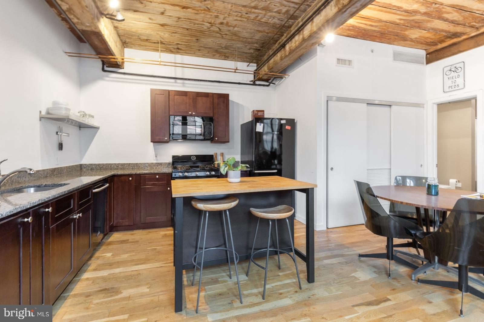 Available Early June:

Welcome to 1737 N Howard St #2B! This is an incredible modern-industrial 1 bedroom, 1 bathroom apartment featuring in-unit laundry, hardwood floors, recessed lighting, and central air for comfort all year long. Exposed beams and brick walls run the full length of the unit for an elevated atmosphere. Enter into the large kitchen area boasting ample cabinetry, granite counters, and a full lineup of sleek black appliances. The common area is flooded in sunlight and offers great space for your furnishings. There's a hall closet with your stacked washer and dryer for added convenience. Continue back to your bedroom offering 2 closets and tons of natural light - perfect for your plants! The beautiful jack & jill bathroom features tile flooring, a bathtub-shower combo, exposed spiral ductwork, and a granite-topped vanity for storage. Schedule your tour today!

About The Neighborhood:

Enjoy the lush greenery of Norris Square Park just steps away. Seamless commuting is at your fingertips with easy access to public transportation including the Market-Frankford Line and numerous bus routes. For highway access, I-95 is conveniently close. Indulge in local delights with iconic hotspots like Stateside Vodka, Four Humours, Evil Genius Beer Company, Goldie, Gryphon Cafe, LMNO, and countless more!

Lease Terms:

Generally, first month, last month, and one month security deposit due at, or prior to, lease signing. Other terms may be required by Landlord. $55 application fee per applicant. Cats and small dogs are conditional on owner's approval and may require an additional fee and/or monthly pet rent, if accepted. (Generally, $500/dog and $250/cat, and/or monthly pet rent). Please note there is a 35lb max weight limit. Tenants responsible for: electricity, gas, cable/internet, and a $25/month flat water fee. Landlord Requirements: Applicants to make 3x the monthly rent in verifiable net income, credit history to be considered (i.e. no active collections), no evictions within the past 4 years, and must have a verifiable rental history with on-time rental payments. Exceptions to this criteria may exist under the law and will be considered.