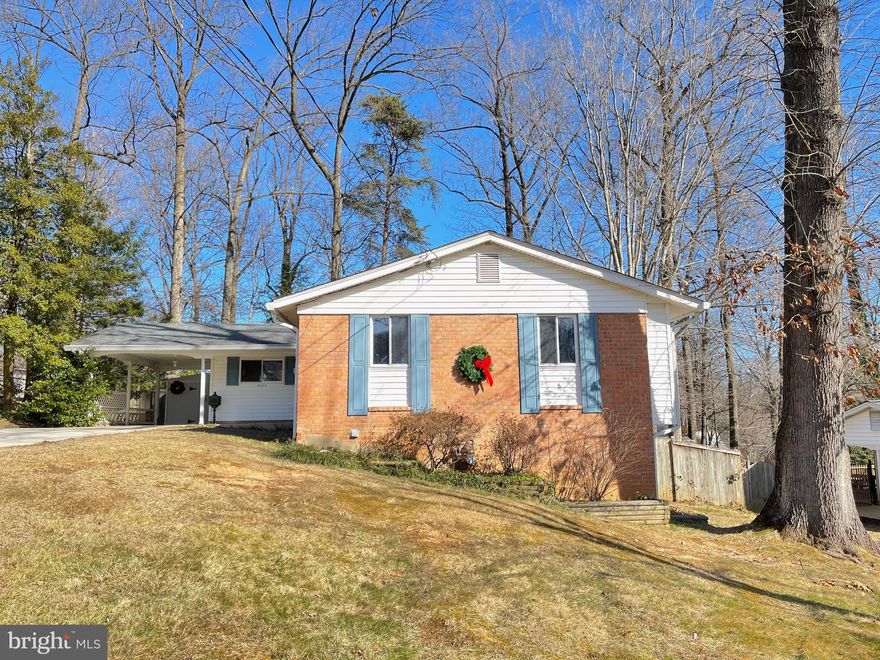 Beautifully renovated 4 bedroom home in Kings Park area of Springfield.  Kitchen totally renovated, with new stainless steel appliances (gas cooking), new cabinetry, quartz countertops and luxury vinyl plank flooring.  The 20' x 12' deck out back is perfect for entertaining or grilling. Hardwood floors on main level have been restored to their original glory.   Lighting fixtures updated.  Hallway bathroom has new cabinet, lighting and toilet with luxury vinyl plank flooring with tub/shower.  Primary bathroom has been remodeled with new cabinet, lighting and toilet, as well as shower stall.  Lower level has new carpet throughout.  Large rec room opens to side yard via sliding glass door with small patio.  Another good-sized room in the basement has door to side yard and patio.  4th bedroom in basement with small bathroom with new everything and shower stall.  The basement area would be perfect for someone to have their own space, along with private entrance. Laundry room with lots of shelves for storage. This home is really deceiving from the outside...much more room than you would imagine.  Close to bus routes, shopping and restaurants.  Not far at all from I-95.  Don't miss out on this one!   Floor plan included in pictures.