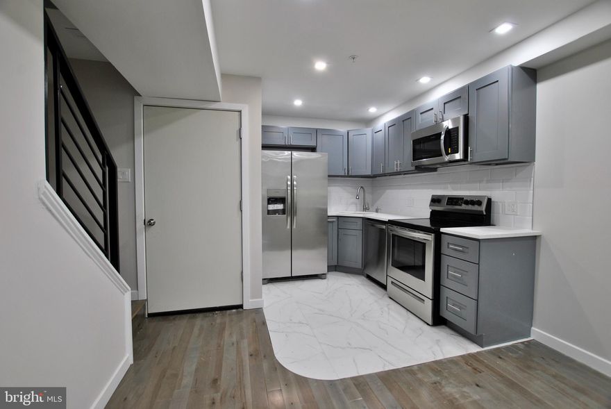 Unit 4
BI-LEVEL 
THREE BEDROOM
THREE BATH
BRAND NEW APPLIANCES
CENTRAL AIR AND HEAT
HARDWOOD FLOORING
LARGE BEDROOMS
CERAMIC IN KITCHEN AND BATHROOM
BRAND NEW CONSTRUCTION LUXURY APARTMENT
WASHER AND DRYER IN UNIT
TEMPLE UNIVERSITY
TENANT PAYS FOR $50 A MONTH FOR WATER

THERE ARE MORE APARTMENTS AVAILABLE. 2 BEDROOMS AND 3 BEDROOMS !!