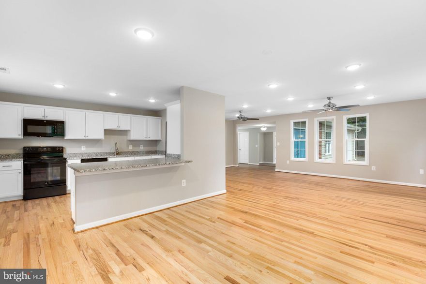 Welcome Home! This beautiful ranch has been completely renovated and is one level living at its best. Inside you'll find an open concept floor plan complete with newly restored hardwood floors and new carpet throughout. The stylish kitchen's granite counters, upgraded appliances, new cabinets and large eating bar  are perfect for family gatherings.  The four bedrooms (1 non Conf) and separate office offer ample space for an active family to spread out. Outside there's a large fenced yard as well as a built in fire pit for those chilly nights. This home won't last long. Schedule a showing today!