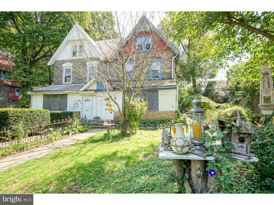Classic 3-story Mt. Airy Twin with tons of charm! First floor features spacious sun room, large living room with Victorian fireplace, formal dining room with plenty of sunlight and additional fireplace, huge eat in kitchen offers plenty of counter space, gas range, dishwasher, full bath with pedestal sink, ceramic stall shower, and exit to magnificent rear yard. Second floor has three huge bedrooms, master bedroom and second bedroom has fireplace,and hall bath with ceramic tub surround. Third floor offers three additional rooms perfect for office space or artist studio. This home has gorgeous hardwood floors throughout and five fireplaces with fascinating tile work. Great opportunity to own a home with plenty of old world charm and character. Easy to show!