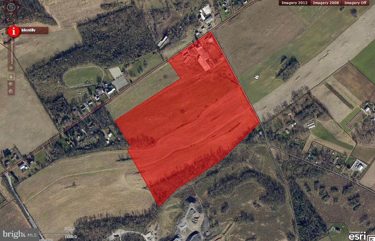 62 acre Farm +,42 ac of land, total of 104 acres for $1,560,000, additional land available, priced at 15,000 per acre, limestone ,extremely lg manure lagoon w/concrete ramp , 62 ac land preservation, 2 roads frontage,ex rainfall area,any additional land is priced at 15,000 per acre