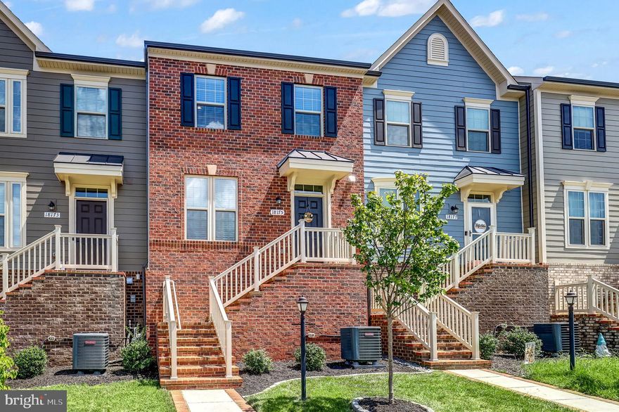 Welcome to this beautiful, move-in ready home in the sought-after Potomac Shores community! This brick-front townhome is only three years old and with 2,100+ finished square feet on three finished levels. it offers the perfect blend of luxury, comfort, and convenience and you will just love all the natural light that shines throughout this open floor plan. The main level seamlessly connects the family room, kitchen, and dining area. A cozy sitting area here as well invites relaxation and conversation. The sun-filled kitchen is the heart of the home with it's huge island, stainless steel appliances, granite countertops, upgraded cabinets, pantry, and an additional countertop area which makes for a great coffee station. Step outside onto your deck which is a perfect spot for grilling. A half bathroom completes this main level. Upstairs are three Bedrooms including the spacious Primary Bedroom Suite with it's trey ceiling, ceiling fan, walk-in closet, and attached primary bathroom that has both a soaking tub and walk-in shower. The other two bedrooms both have ceiling fans and ample closet space. Make your way downstairs to the finished basement. Here you access the two car, rear-facing garage as well as a spacious room with french doors that has served as a guest retreat with an adjacent full bathroom, which could be a great home office or hobby room. The monthly HOA fee of $200 includes not only internet service and trash removal but also grants you access to an extraordinary array of amenities at Potomac Shores. Enjoy the sports complex, the community garden, playgrounds, numerous parks and trails. Launch your kayak from the designated point, golf at the Jack Nicklaus golf club. Also included is the fitness barn featuring pools, a gym, and a clubhouse. tennis and basketball courts, yoga on the lawn, and the convenience of an onsite restaurant for dining out without leaving the neighborhood. Just minutes away from I-95, Rt. 1, Quantico, Stonebridge Town Center, and Potomac Mills. Excitingly, a future VRE station and town center are in the plans and under development, promising even more convenience and value. Call for your tour, today!