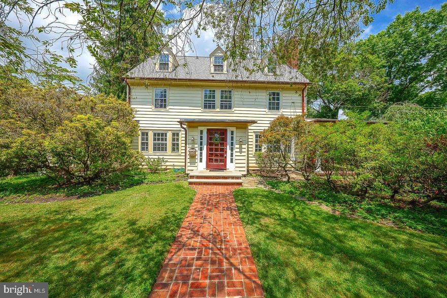 Take another look at this beautiful colonial home situated in the highly desirable neighborhood of South Wayne, Radnor Township! This six bedroom, three and a half bath home is an opportunity for its next owner to update with their own creative preferences.  The kitchen overlooks the rear lawn and features granite countertops, stainless steel appliances, and an adjacent butler's pantry with its own sink and original 1913 glass door cabinetry.  Original hardwood floors and crafted millwork are visible in most areas of the home with high ceilings throughout the first floor and French doors that allow for plenty of light.  Outdoor spaces are ideal for entertaining and include a covered patio and large deck with stairs to the lawn.  A stone patio serves as a great location for outdoor cooking.  Renovations may present the opportunity to convert the first floor office, den, and bathroom area into a private in-law suite with a sunroom and separate side entrance. The property currently has a generously sized yard with carefully selected mature plantings that will be appreciated by the owners and guests alike.  A subdivision plan that shows the rear portion of the property facing Conestoga Road could potentially support new construction is available upon request.  Amenities available by way of a short walk include the Wayne Train Station, Radnor Middle School,  the Radnor Trail, and many shops and restaurants.