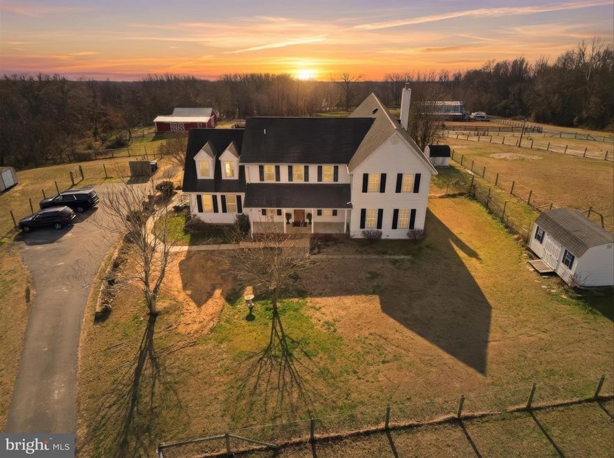 Bring your horses home to Charlotte Hall! Situated on nearly 8 acres, this exceptional equestrian property offers the perfect blend of space, character, and modern functionality. From the beautiful grounds outfitted for horses to the expansive 3,900-square-foot home, there is truly room for everyone. Originally built in 1950, the original home maintains a lot of character while the thoughtful additions include many updates. The lower level features a large primary or in-law suite, second bedroom or spacious office and two full bathrooms. The large eat-in gourmet kitchen is a chef's dream featuring a prep sink, double oven, two microwaves, workstation and abundant cabinet space including a walk-in pantry. The laundry room is outfitted for two washers and two dryers and additional storage space. The cozy living room offers a wood stove and walk out access to the expansive screened in porch, perfect for relaxing or entertaining. Upstairs there are four additional bedrooms including another primary suite featuring dual living spaces, office, ample closet space and a large bathroom with soaking tub and walk-in shower.  The primary suite features walk out access to a second level deck overlooking the backyard and horse pastures. 
Venture outside to a well-maintained property perfect for horse enthusiasts and animal lovers alike. The six-stall barn is equipped with water and electric and features and additional feed/tack room. Other equestrian features include a lighted arena and round pen, and multiple pastures with vinyl fencing. A stream lines the rear of the property along the horse walking trail. Three additional sheds are throughout the property providing storage for all your outdoor needs. 
The property also features RV hookup with 30/50 amp hookups, room for trailer parking, ample additional parking and is equipped with high-speed internet. Located in Charlotte Hall with easy access to LaPlata or Charlotte Hall restaurants and shopping and commuting distance to DC, PAX River, Andrews, Indian Head or Dahlgren Bases. This one is a must-see!