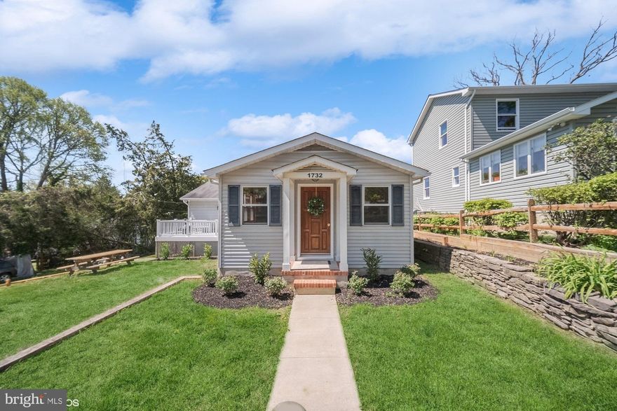 JUST REDUCED! A Fantastic Opportunity to own a Renovated Home in this Water Privileged Community with Fabulous Amenities! Just a few blocks from the Water with access to the Community Pier, 5 Sandy Beaches, Playgrounds, Picnic Areas, a Marina, and Boat launch! 
Convenient to Great Restaurants, Shopping and More! Beautiful Refinished Wood Floors and Wood Trim on the Main level give this home a Coastal Farmhouse feel! Beautiful New Bright White Kitchen with Granite Counters, Stainless Appliance Suite and a Cozy Wood Stove. 
Don't Miss the Gorgeous and Spacious Primary Suite with So much Closet Space offering a Fabulous Custom En-suite Bath and Separate Dressing area that Walks out to the deck. 
There are 2 Additional Bedrooms and an updated Full bath to Complete the Main Level. The Hallway Closet offers a crafty Laundry chute for convenience. 
Follow the stairs down to the Sun filled Walk-out Lower Level where the Laundry area and Front Loading Washer and Dryer are located. This space is ready for your finishing touches including a Rough-in for another Bathroom, Separate Entrance and Egress Window offering so many possibilities! New Crushed Stone Driveway and New HVAC System were just installed!