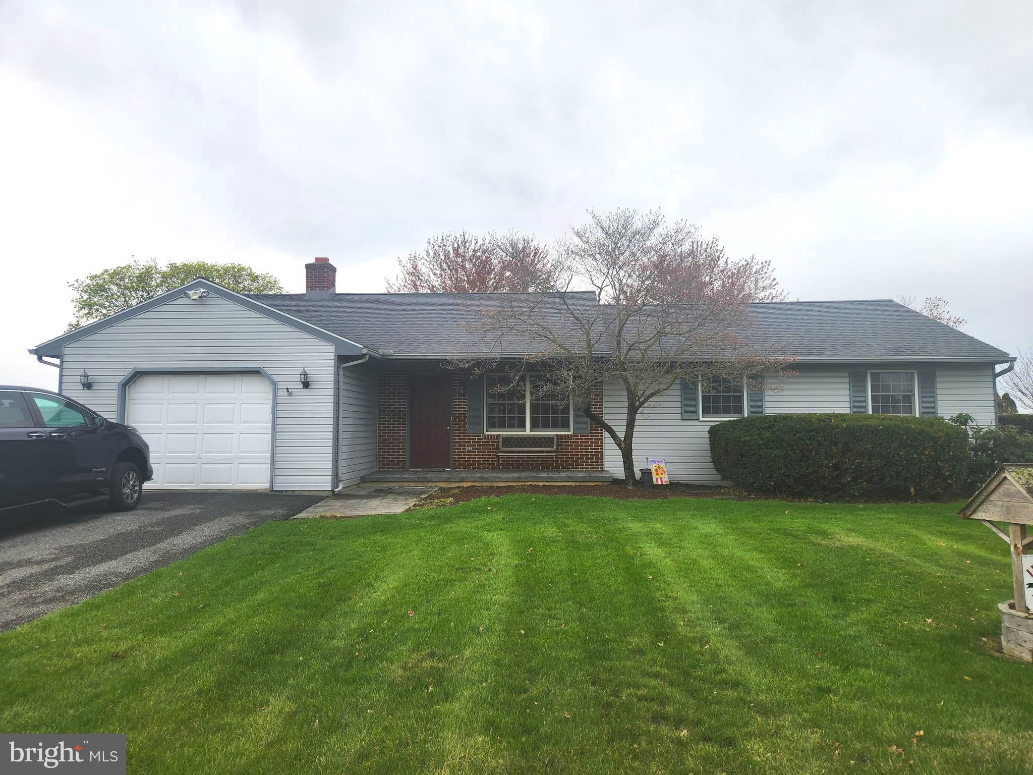 This property will be offered at Public Auction on Tuesday, May 20, 2025 @ 6pm. The listing price is the opening bid only and in no way reflects the final sale price. 10% down due at auction, 2% transfer tax to be paid by the purchaser, real estate taxes prorated. This ranch home, located in a rural neighborhood surrounded by farmland, is situated on approximately half an acre. The main level includes a living room, a kitchen with adjoining dining area, and a spacious family room with a wood-burning stove and access to the screened porch. Three bedrooms and two full bathrooms are also located on the main floor, including a primary suite with a private bath. The basement features a second family room, an office area, a powder room, and a storage space. Additional amenities include an attached garage, an outdoor deck with access to the screened porch, a 10’x12’ shed, handicap-accessible doorways throughout the main level, and convenient access to Routes 283 and 230.