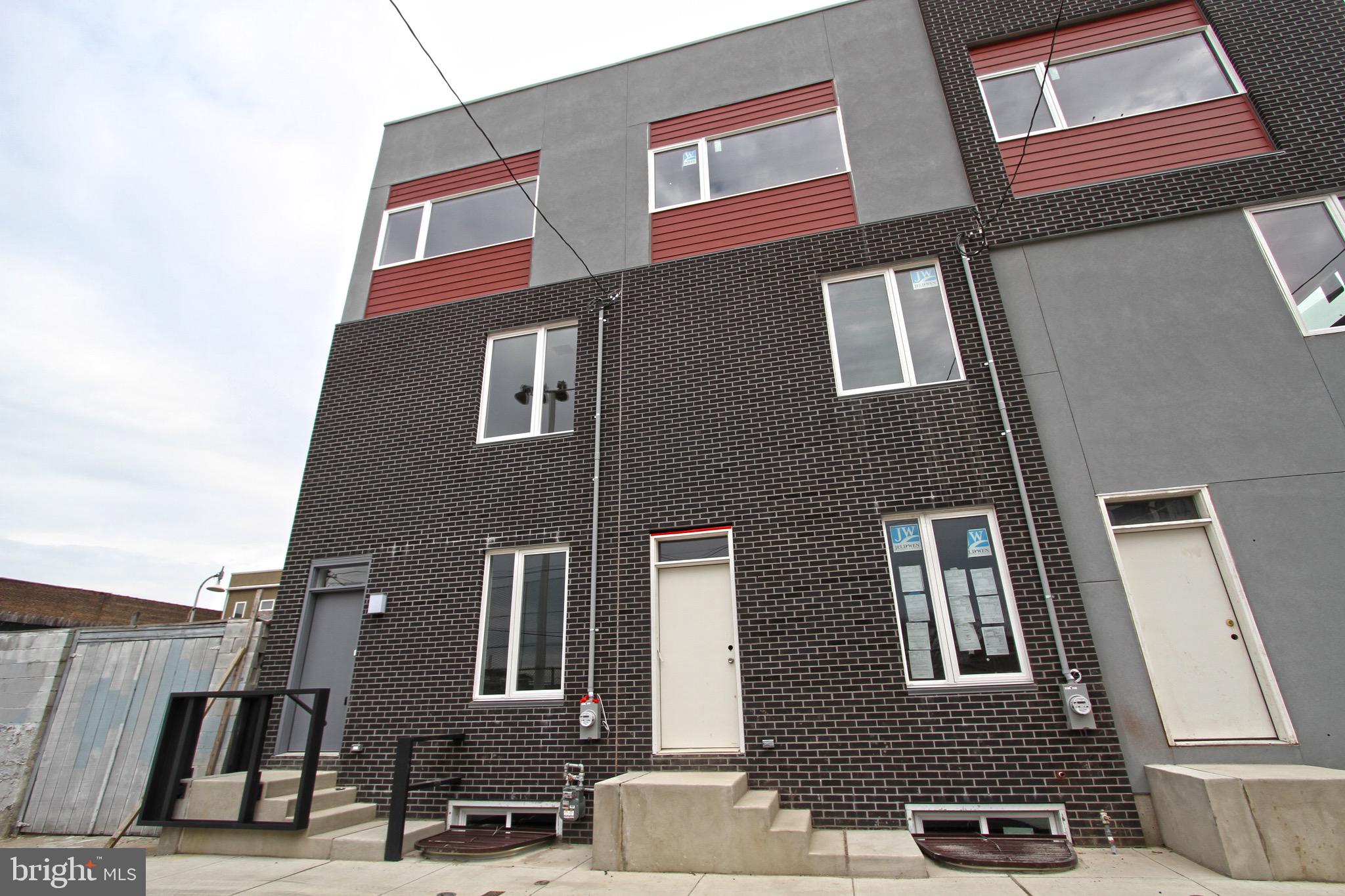Beautiful townhouse located in the heart of Fishtown, this HOT!!! property offers 3 bedrooms, flex space, finished basement with 2.5 baths spread over 2,300 square feet of modern living space. Roof top deck with stunning panoramic skyline city views. 1 off-street parking included. Stunning kitchen with quartz counter top and all brand new energy efficient appliances. Hardwood floors through out the whole house. Inquire quickly! and don't miss this amazing opportunity to live in this gorgeous home. The natural light filled open floor plan with large windows on the 1st level contains the living room, dining area, half bath and modern kitchen. The kitchen comes equipped with stainless steel appliances, gas range stove, microwave, dishwasher, refrigerator with water and ice dispenser, double sink with garbage disposal, quartz counter top and a tile backslash with modern twist. Large window in the kitchen. All three bedrooms are large and each have built-in closets making this ideal for roommates, a family or anyone who desires some extra space. All baths have modern fixtures & vanities; 1 has a bathtub and the other one has a large tiled shower with all glass doors. Master bedroom located on 2nd level, 2nd and 3rd bedrooms located on 3rd level. This property is Located in the heart of Fishtown, it is within walking distance to many options for dining, cafes and shopping. The home comes with 1 Off-street parking in the back of the house with the private entrance. Easy access to public transportation if needed, Located half a block from Frankford avenue and 1 block from Subway station. Central Air, Forced hot air heat, gas, furnace, wired for cable. Security System installed (not activated), if tenant chooses to use the security system - they will have to activate it ($35-45/ month). We welcome your visit today!