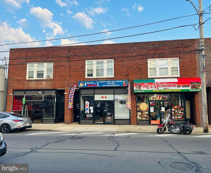 Great investment property offers  3 retail storefronts (1st floor), 3 residential apartments (2nd floor). Rear parking (approx. 10 -12 spaces). Commercial : Unit 14: 935 SF + full basement (currently vacant) , Unit 16: 1,035 SF – Barber Shop – $1,200/month. Unit 18: 1,000 SF – Grocery Store – $1,250/month.   Month to month leases.  Residential:  3  apartments,  2 Bedrooms / 1 Bathroom, $1,400/month per unit.  Separate utilities, Tenants pay their own electric and gas ( heating) bills. Month to month leases. The three second floor apartments are below market rates, good opportunity to increase rents. Mechanicals have been updated in the past 10 years including electrical system, new central AC in apartments in 2025.
Seller is also selling 424 N Springfield Ave Clifton Heights property. Would prefer to sell as a package deal. Property is listed in MLS#  PADE2108698