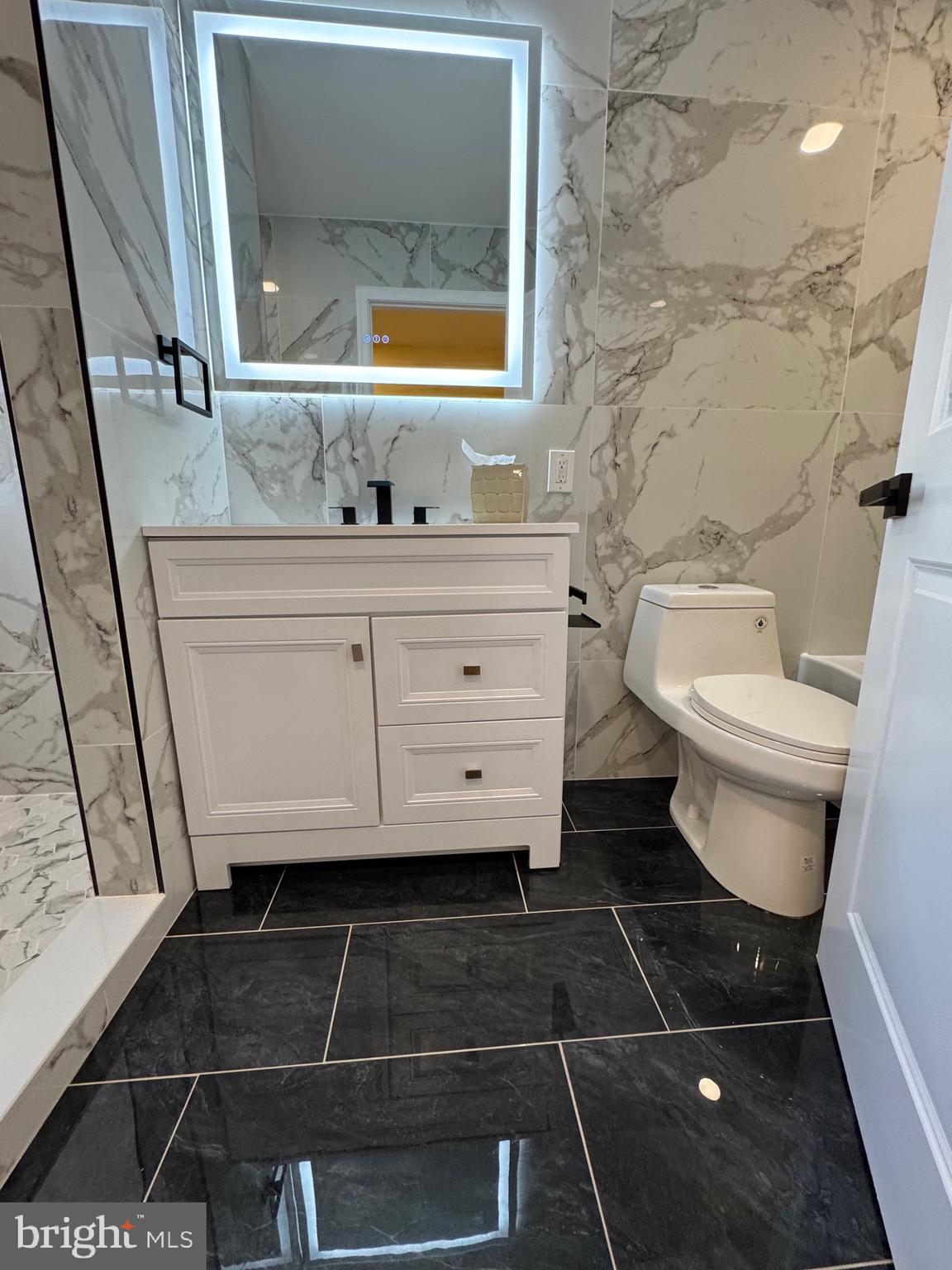 This beautifully rehabbed 2-bedroom, 1.5-bath gem blends comfort and character just steps from all the action. Enjoy a spacious living room with a cozy fireplace, a first-floor powder room, and a large backyard perfect for relaxing or entertaining. Upstairs, you'll find two generously sized bedrooms and a full bath with both a stall shower and soaking tub. All this, just minutes from Fishtown’s top restaurants, cafes, and nightlife!