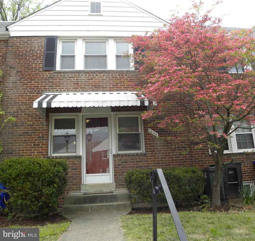 Charming light filled 2 bedroom, 1 bath brick townhouse. Short walk to Virginia Square Metro. Kitchen redone. Hardwood floors.  Nice backyard with new patio. Neutral colors. Walk to shops, restaurants, library, park, Giant and movies! Pet, case by case, dogs only, less than 25 pounds, with an extra deposit. Basement perfect for family room. Full size washer and dryer.Ideal location.