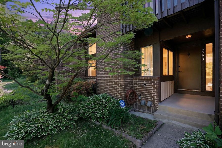 Discover the quintessential Reston lifestyle in this Brick beautifully maintained 3-level townhome in the sought-after Glencourse Cluster, 4 bedrooms and 3.5 Baths. Bathed in natural light, the main level features an open-concept living and dining area centered around a cozy fireplace, seamlessly flowing onto a private deck perfect for alfresco dining amidst the trees. The kitchen is a chef’s delight with updated cabinetry and modern appliances.

The upper level offers a spacious primary suite with private bath, and two additional well-appointed bedrooms with an additional full bath. The fully finished walk-out lower level provides incredible versatility, serving as a family room, home office, or guest suite with a full bath and direct access to a tranquil patio.

Updates: Freshly Painted, new kitchen appliances, new kitchen cabinets, new carpet in the lower level, & newer roof!

2 assigned Parking Spaces make life easy with plenty of ample parking! Live surrounded by nature with access to Reston Association's pools, tennis courts, and 55+ miles of trails. Ideally located minutes from the Reston Town Center, Lake Anne, and the Wiehle-Reston East Metro. This home offers the perfect balance of serenity and urban convenience!