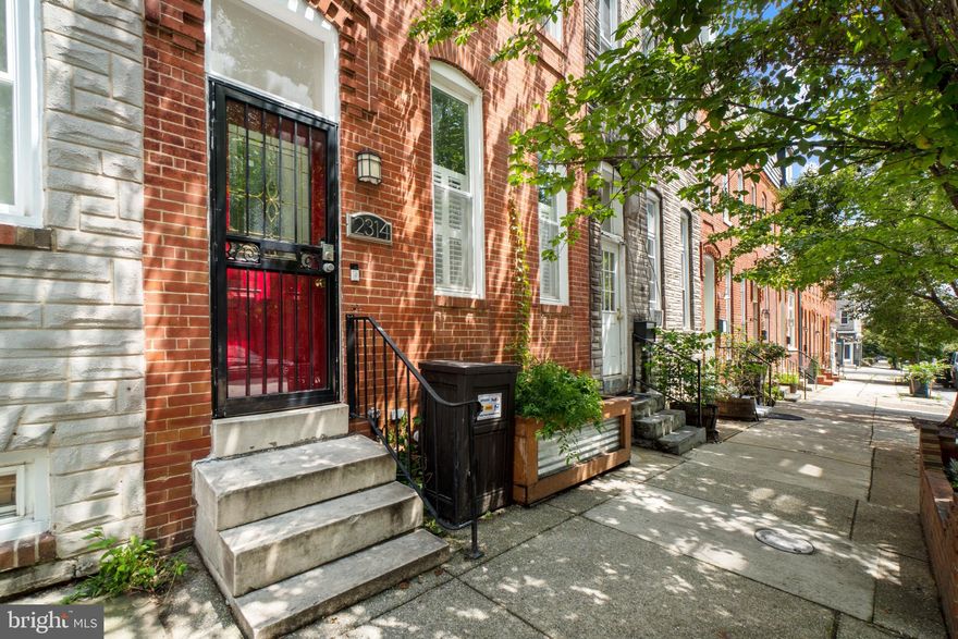 PRICE IMPROVEMENT! Welcome home to this spacious, light-filled Patterson Park gem! Just a couple blocks off the park on a quiet and tree-shaded street, this stunner awaits it's new owners! With it's wide floorplan and large front windows, you will feel almost like you are in a single family home. A cozy living room with a radiant electric fireplace will welcome you upon entering. As you move through the first floor, you will notice the beautiful historical preservation in the crown molding and french doors leading to your formal dining room. The updated kitchen boasts new LVP flooring and granite countertops. There is a full bath tucked away for guests and an oversized parking pad with alleyway access out back, perfect for unloading a car without the fuss of coming in the front door! Making your way to the second level, you will find two oversized bedrooms with beautiful front facing windows that allow the light to shine through, but also have a view of the established trees out front. There are TWO full baths on this floor, including an en-suite bath for the second bedroom which also has a walk-in closet!! As you move up to the third-floor oversized master suite, you will feel dwarfed by the high ceilings and exposed beams throughout. There is a HUGE walk-in closet on this level as well as an upgraded en-suite master bath with modern finishes and marble hex flooring - like your own personal spa! This gorgeous home works well for singles, couples, larger family dynamics and roomates alike... and all in walking distance of Patterson Park, bars, and restaurants, as well as being so close to commuter routes and Inner Harbor/Harbor East/Fed Hill action as well! It is also situated within walking distance of Johns Hopkins medical campus, which makes a convenient commute to daily work! Schedule your private showing today, this one isn't going to stick around!