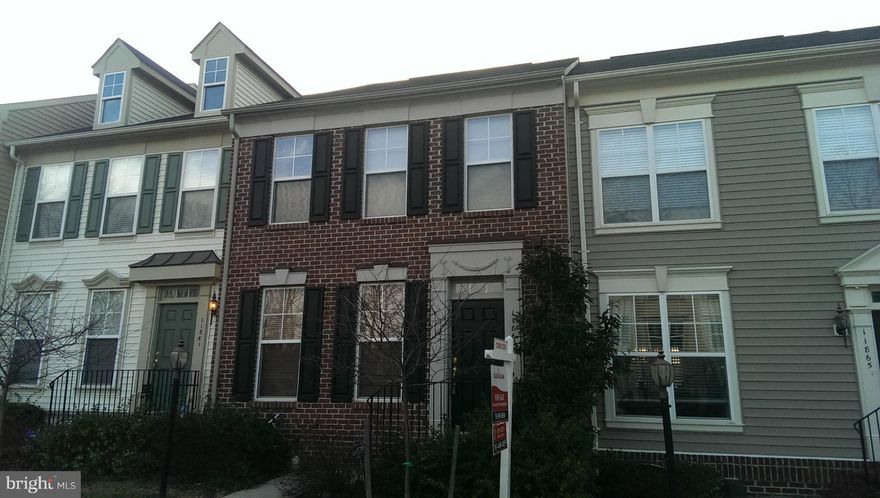 Spacious brick front townhouse in popular Victory Lakes - Lots of natural light - Huge eat in kitchen with cabinets galore, rich hardwood floors and stainless steel appliances - 3 large bedrooms, the Master has 2 closets and separate tub/shower in the bath -  Fully Finished walk out basement with gas fireplace  - Close to elementary school, top floor laundry and much more!!!
