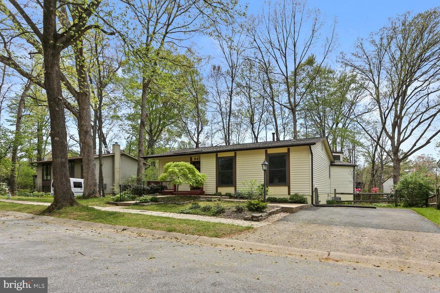 Welcome to 9451 Brett Ln -  a beautifully maintained 3-bedroom, 2-bath rancher in the heart of Columbia. Featuring warm hardwood floors throughout the main level, this inviting home offers a spacious layout with a comfortable living room, formal dining area, and an updated kitchen remodeled in 2022.  The standout feature is the large primary suite addition, complete with vaulted ceilings, a generous walk-in closet, and a stunning en suite bath—your perfect private retreat. Two additional bedrooms and a second full bath complete the main level. The partially finished lower level provides flexible space with a cozy den, bonus room, and abundant storage. Step outside to enjoy the beautifully landscaped backyard, a true gardener's paradise with lush plantings and serene spaces to relax. Notable upgrades include a new roof (2022), water heater (2023), washer and dryer (2018), replacement windows (2015), and a waterproofing system with a lifetime transferable warranty.  Great location close to parks, schools, shopping, and commuter routes, this home offers both comfort and convenience. Don’t miss your chance to make it yours!  OPEN HOUSE Sunday 4/27 11:00am-1:00pm!