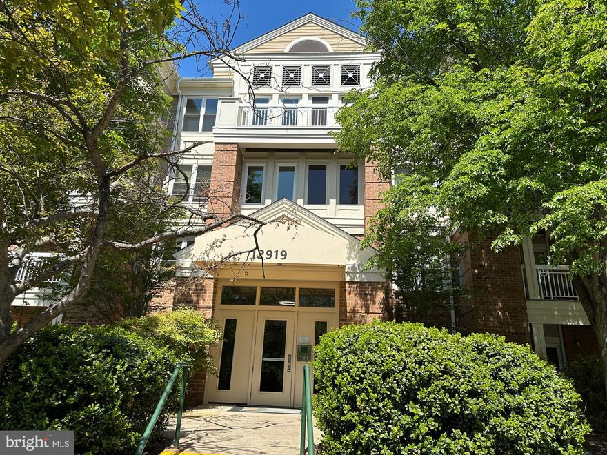 2-bedroom, 2-Full bath, with" ELEVATOR" and  "SECURED GARAGE PARKING SPACE" One Garage Parking and One Outdoor parking!
Community pool and clubhouse with exercise room.
Pet Policy is 2 pets per home...Close to Worldgate shopping and restaurants, 
access to the Toll Road and 1/2 mile to the Herndon Silver line metro station. 
New Flooring. New Microwave.
Laundry is conveniently located in the unit with large capacity washer and dryer.
2 Pets are allowed per unit. Total of both pets  should be under 100 Pounds. Non-Smoking in the building.