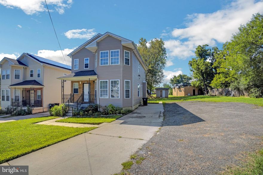 Welcome to this 5 bedroom 3.5 bath home in Sylvan Vista. Walk into a light and bright living room with wood floors, recessed lighting and bay windows. Easily move into the eat in kitchen with plenty of counter space, cabinet space and stainless steel appliances including gas stove and french door refrigerator with ice maker. A door leads to the driveway for easy grocery unloading. A bedroom on the main level is perfect for easy living or convert into another living space. Room is completed by a cozy fireplace. Retreat to the spacious primary suite with bay window, walk in closet and en-suite with dual vanity and tub shower. Two bedrooms with laminate flooring and hall bath complete the level. The lower level is perfect for in-law suite or rental opportunity with separate entrance kitchenette and private bedroom and bathroom. There is plenty of parking in the large driveway. Easy access to commuter routes, Cheverly and Deanwood Metro stops as well as shopping and dining.