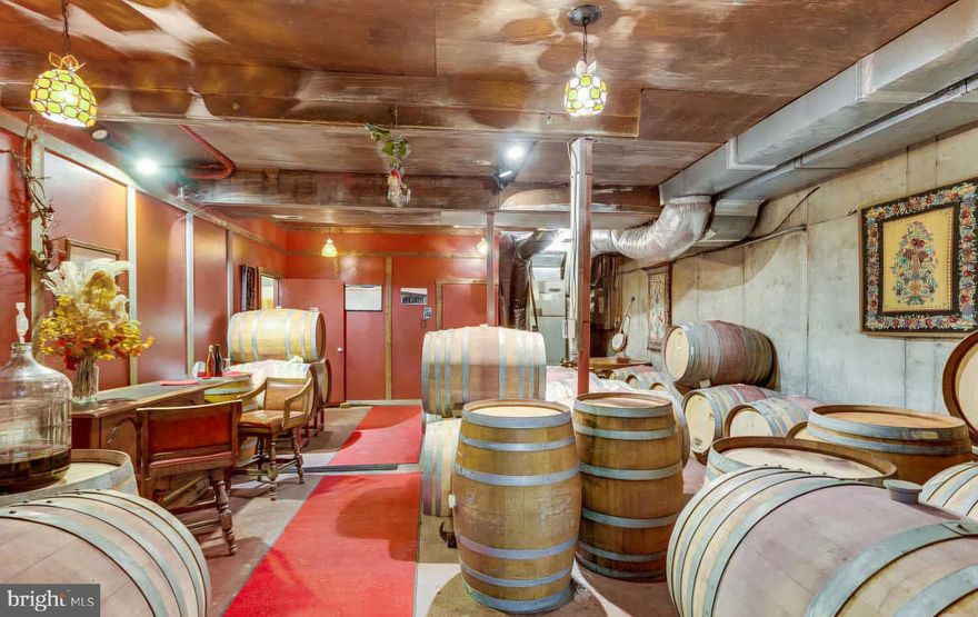 Opportunity to own one of Shenandoah Valley’s oldest wineries in the fruitful Shenandoah AVA, known for growing high-quality grapes. North Mountain’s wines are currently made on-site in a large production space, however, with many customer crush services available in Virginia, the grapes can be processed off-site. Currently, there are 14-15 acres of grapevines situated on 47.5 acres of rolling hills. This winery once boasted high revenue growth, but over time, the owner has slowed down and now, wants to retire. The property has beautiful views of the Blue Ridge Mountain and North Mountain. It is a short distance from Washington, D.C, Northern VA, and Maryland. The owner and family have set up a perfect foundation for the next owner to build upon. The offering consists of two parcels spanning over 47.5 acres of vineyards, rolling hills, woodlands, and open land. This property is unique as there are 2 perked sites situated throughout this pretty landscape allowing for more building. The iconic winery building (2984 sf) has everything housed in one. The basement boasts a larger production space with crush pad, the main floor consists of the tasting room and enclosed sunroom allowing for events and more seating, and an owner’s apartment situated at the top.  The 47.5 acres are tucked away from the road providing guests with a very serene and relaxing environment. There are additional out-buildings situated on the property. The temperature-controlled production facility has a capacity for around 3000 cases per year with adequate storage capacity. This winery sits close to other wineries and hospitality establishments making it a nice hop on a weekend getaway. There is so much income potential with this property to offer weddings, corporate retreats, family gatherings, and guests who want to enjoy the scenery for a weekend. Bring new life into this iconic winery by revamping the wine offerings, increasing production, increasing the wine club, having weddings on site, and more. The potential is endless with new ownership! Additional business information and private tours available upon the execution of a Non-Disclosure Agreement and a verifiable Proof of Funds from a recognized financial institution.