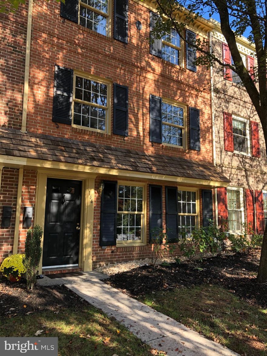 Welcome to Roboda's Lower Village Square! This spacious three- story townhouse is move-in ready!!  Reminiscent of historic Williamsburg, attention to detail is evident in the architecture of these homes! From the boot-scrape, to the fire-mark, the cedar-shingle eave, and the dental trim work, all are  historically accurate.  Freshly painted throughout, the first floor entry hall opens to a bright and airy family room, perfect for a home office, media room, whatever you decide!  The back portion of this level houses the laundry, with deep sink , utility area, and an adjacent door leads to an area plumbed for a bathroom.  Oak stairs  to the main level which features  a beautiful,  wide-open living room and dining area with hardwood flooring!  The ideal place to entertain!!  The  bright and airy eat-in front kitchen is huge,  with lots of cabinets, plus pantry storage, and a convenient pass-thru to the dining room. The powder room has been tastefully updated. Newer sliders to the private fenced patio and rear garden  completes this level.  The third floor features a master bedroom with two spacious closets. Two additional bedrooms are on this level, as well as a large hall linen closet! The two-room bath   features updated double-sink vanity and beautiful new tile flooring!   Pull-down steps to attic storage completes this level! One Year HSA Home Warranty Included!  This captivating setting with flowering trees, sitting areas with benches, and meandering sidewalks throughout invites you enjoy the scenery. There's a walking trail and Foot Bridge by the Mingo Creek, basketball court, a fenced dog-exercise area, and open space, there is also a playground! Community activities for all! And, Mail is delivered to your door! All of this in the  Award -winning Springford School District! Just minutes from schools, shopping, and major routes. So convenient, yet tucked away in the rolling hills of Montgomery county, Roboda continues to be a most desirable place to live.  Please mind our 10mph speed limit. Parking space, marked with the Flag is reserved for this home.  *Room sizes are approximate. Buyers are encouraged to check room sizes for verification.