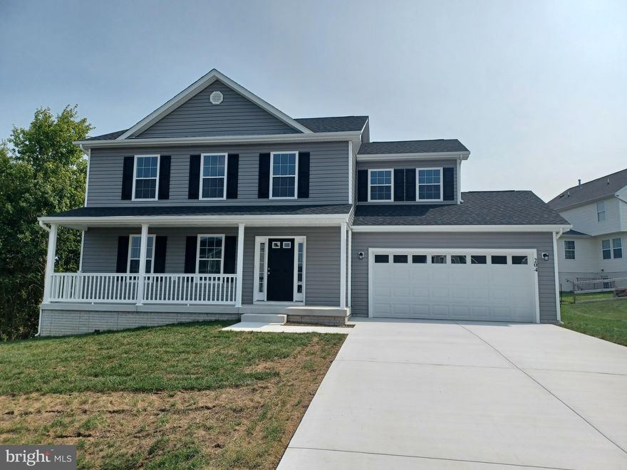 Great family home situated well established neighborhood and located on a cul de sac. Great commuter location and convenient to schools & shopping. Kitchen has granite countertops with island and is open to family room. LVP flooring in  foyer, dining and Kitchen area.  Living room has carpet. 10 X 12  deck and accessible from the kitchen for easy grilling or enjoying your morning coffee.   This home features 3 large bedrooms and a primary suite with tray ceilings on the upper level.   All bedrooms have standard fan/lights. Primary bath has ceramic flooring and ceramic surround in oversized shower with seat, glass doors and a walk in closet.  Laundry room on bedroom level with tiled flooring.  Walk out basement with plumbing for future 3rd bath.  Backing to common land and on a cul-de-sac. Two car garage which is insulated, lots electrical outlets, insulated garage door and opener.   Photos shown are of similar construction but may show some upgrades. Tons of standard features that other builders charge for as options. Depending on stage of construction, Homeowner may pick all interior finishes. Models Available for viewing. As with all new construction, WV transfer taxes are paid by Purchaser.