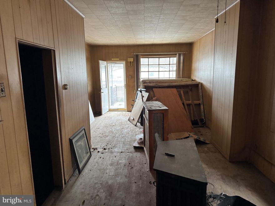 Here is your next project.  Current layout has an additional basement kitchen and previous bathroom with potential to make this a 2 unit  with township approval or have a full home with basement Inlaw suit. Come take a look for your self. Home is sold as is and cash sales only.