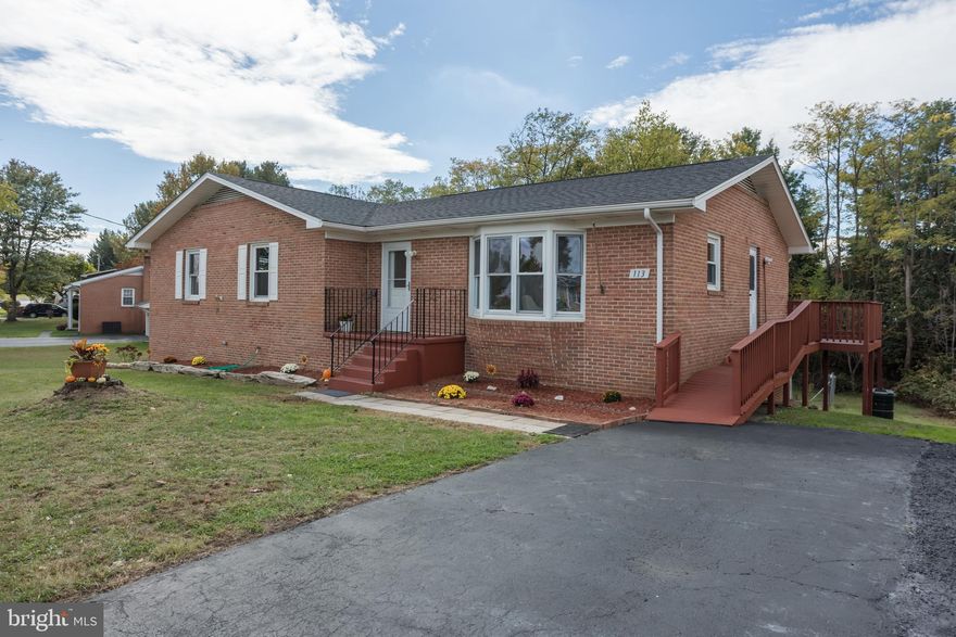 Charming All-Brick Ranch just minutes from  in Prime Winchester Location. Beautifully maintained all-brick ranch just minutes from Jim Barnett Park, Winchester Country Club, shopping, and everyday amenities. This well built home blends timeless craftmanship with modern comfort and offers the ease of low maintenance, energy efficient brick construction. Step inside to discover a spacious main level featuring a large primary bedroom with beautifully updated en suite bathroom showcasing natural stone tile and walk in shower. Two additional generous bedrooms and a hall bath with a tub provide plenty of space for family or guess. The bright, eat in kitchen is filled with natural light, featuring  waterproof luxury vinyl plank (LVP) flooring, and opens directly onto a private deck-perfect for morning coffee or evening relaxation. Hardwood floors flow throughout the rest of the main level, adding warmth and style. The fully finished basement feels like a second living area ,offering spacious recreation room, home office with  fireplace, laundry area-plus a walk out door and additional rear entry for convenience. With it's natural light and flexible layout, this level is ideal for multigenerational living, guest quarters, or a home business. Enjoy the outdoors with a covered rear patio featuring a gas line for grilling. overlooking a fenced backyard perfect for pets, gardening, or entertaining. The property is enhanced by fruit trees and fig, raspberry, and blackberry bushes, creating a private garden oasis. This home offers quality construction, thoughtful updates, and a peaceful setting just minutes from everything Winchester has to offer. Move-in ready and sure to impress-come see why this is the perfect place to call home!