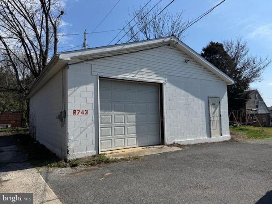 RARE GARAGE SPACE OPPORTUNITY located in alley behind 400 W. Howard Street.   One level garage with 1200 square feet ideal for warehouse storage, auto repair/storage, woodworking, contractor storage space...or whatever your needs may be.  Vinyl sided building with electric and concrete floor.  Sold strictly AS-IS.  Tenant occupied and will require at least 24 hours to coordinate for showings.  This is an exceptionally rare chance to acquire versatile garage space in the city of Hagerstown.  As information, and listed separately, is the garage directly in front of this one (400 W. Howard St. Rear) MDWA2035434, offered at $65,000.  Opportunities like this don't come around often to own two spacious garages, positioned side by side and offering exceptional flexibility for a variety of uses.