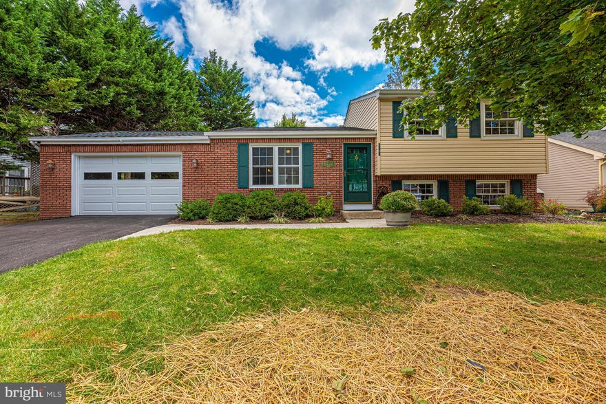 Sellers remarks: 
    This home is on a  cul-de-sac &  is move in ready.  Interior was re-done 7 years ago, including all new kitchen, cabinets, counter, backsplash, appliances, sink, faucet, under cabinet lightening, recessed ceiling lights and more.  Flooring updated on all levels and stairs.  The large table space kitchen exits through sliding glass doors with internal blinds onto the freshly stained 10 x 20 deck.   2 updated full baths with vanities, faucets, mirrors, toilets, lighting, and fans all replaced 7 years ago.  Finished lower level is very cozy with a beautiful custom brick wall and stone mantel wood burning fireplace and lots of recessed lighting in the family room.  Bright laundry room with 7-year-old washer & dryer and lots of storage cabinets has a walk out into fenced back yard.  Very large crawl space for storage in addition to a wood floor garage attic.  Oversized 1 Â½ car garage with garage door opener, work bench, and door to back yard.  Driveway recently paved and widened to fit 2 cars.  Roof replaced 7 years ago; heat pump replaced 9 years ago. All doorknobs, dead bolts, storm door, interior doors, closet doors, lighting, ceiling fans, outlets, switches, and blinds on all windows replaced 7 years ago.  SmartKey exterior door locks re-key by owner in seconds.  Stucco ceilings replaced with flat ceilings. Freshly painted walls and ceilings throughout.  Lots of natural light throughout the house.  Sellers have taken great care of this home and it shows.  Convenient to major highways, shopping, restaurants, schools and much more.