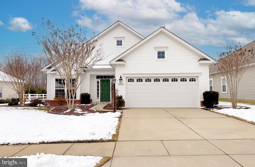 This home looks brand new.  Beautiful Rambler in The Heritage  of St. Charles.  Porcelain Floors through-out the home.  Formal Living Room with Ceiling Fan, Country Kitchen with Large Island, Large Pantry, Side by Side Refrigerator, Stainless Steel Dishwasher, Gas Stove, Primary Bedroom very large, Ceiling Fan, Primary Bath with Ceramic Shower with two shower heads and hand bar, Oval Tub with Hand bars, 2 Nice size secondary bedrooms with Ceiling Fans and Blackout Shades, Full Hall Bath with Single Vanity, Medicine Cabinet Ceramic Tub/Shower Combination and Ceramic Flooring.   Gas Fireplace in Family Room with Beautiful Mantel and Ceiling Fan.  Family Room leads to a very nice 16 x 16 Screened Porch with Cathedral Ceiling, Ceiling Fan, blinds and stamped concrete floor.  Back yard is all open and backs to no houses, open space.  10 x 10 Brick Paver Patio off of Screened Porch.  Beautifully landscaped,  Sprinkler System.