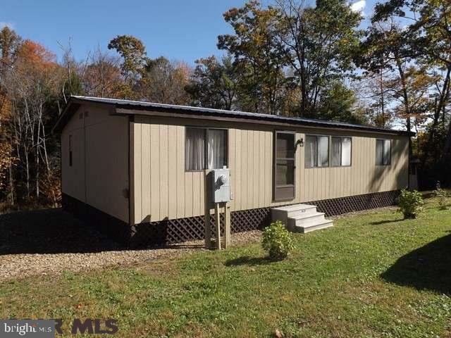 The perfect place to escape from the hustle and bustle. Quaint home, fully furnished on 2.667 acres with relaxing brook bordering the back boundary. 3 bedrooms, 2 full baths, living room, dining room and fully equipped kitchen. Affordable and move-in ready, this property is just waiting for you to make it your next home. Financing available with as little as 3 to 5% down to qualified buyers. Call listing agent for details. -- Call for your tour today. Visit Virtual Tour at http://rem.ax/2mNrmcV
