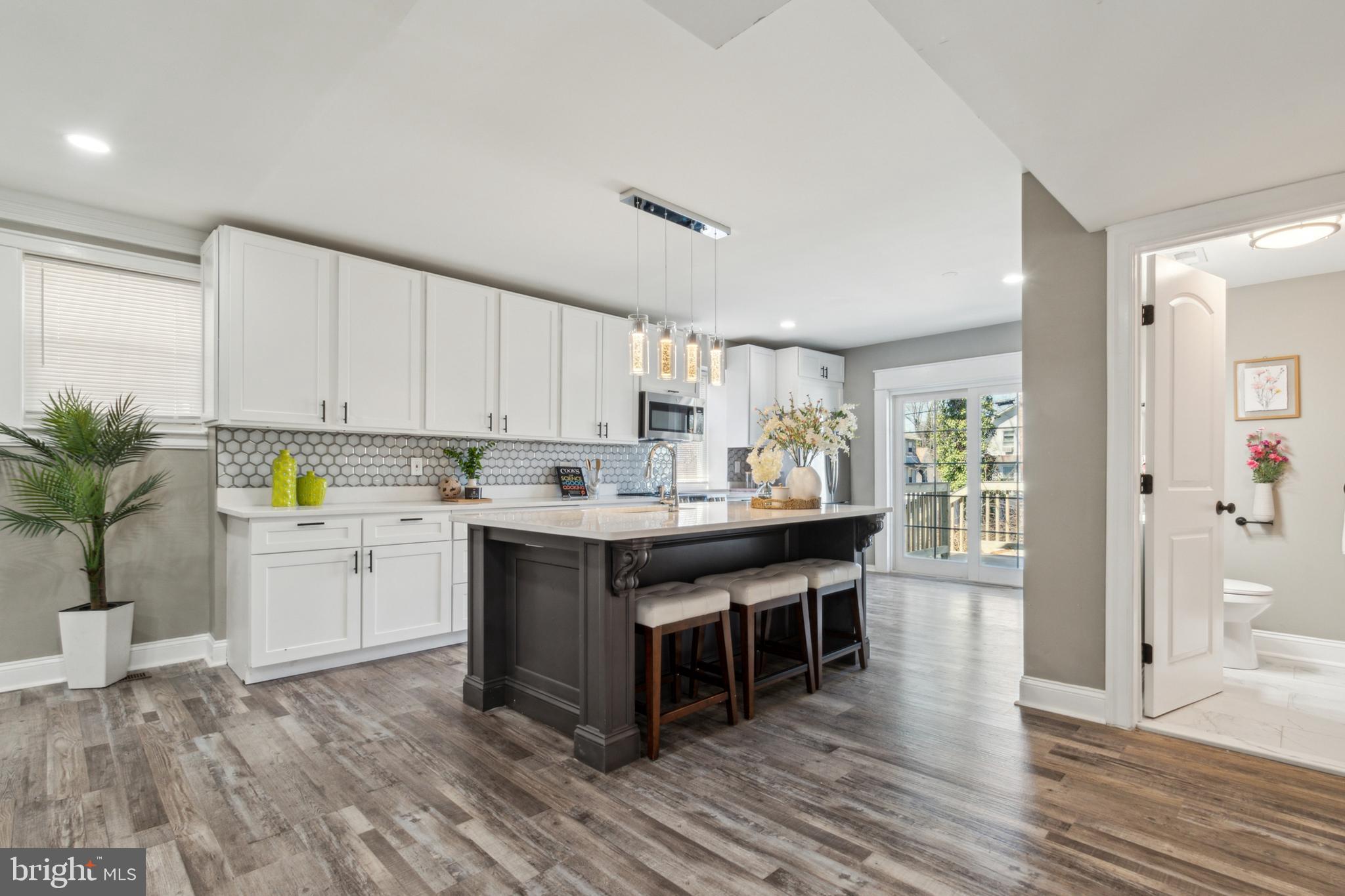 Welcome to this stunning, fully transformed home in the highly sought-after Glen Ave neighborhood! Boasting 6 spacious bedrooms and 3 full bathrooms, this beautifully renovated residence offers a perfect blend of modern style and functionality. Each floor features two bedrooms and a full bath, providing flexibility and convenience for any living arrangement. The heart of the home is the amazing kitchen, complete with a huge island, sleek finishes, and an open-concept design that flows seamlessly into the living and dining areas—perfect for entertaining. Don’t miss this incredible opportunity to own a move-in-ready home in a prime location!
Take a look at the New Cement driveway long enough for 2 cars and the new gorgeous deck to enjoy your coffee on in the morning or relaxation anytime.