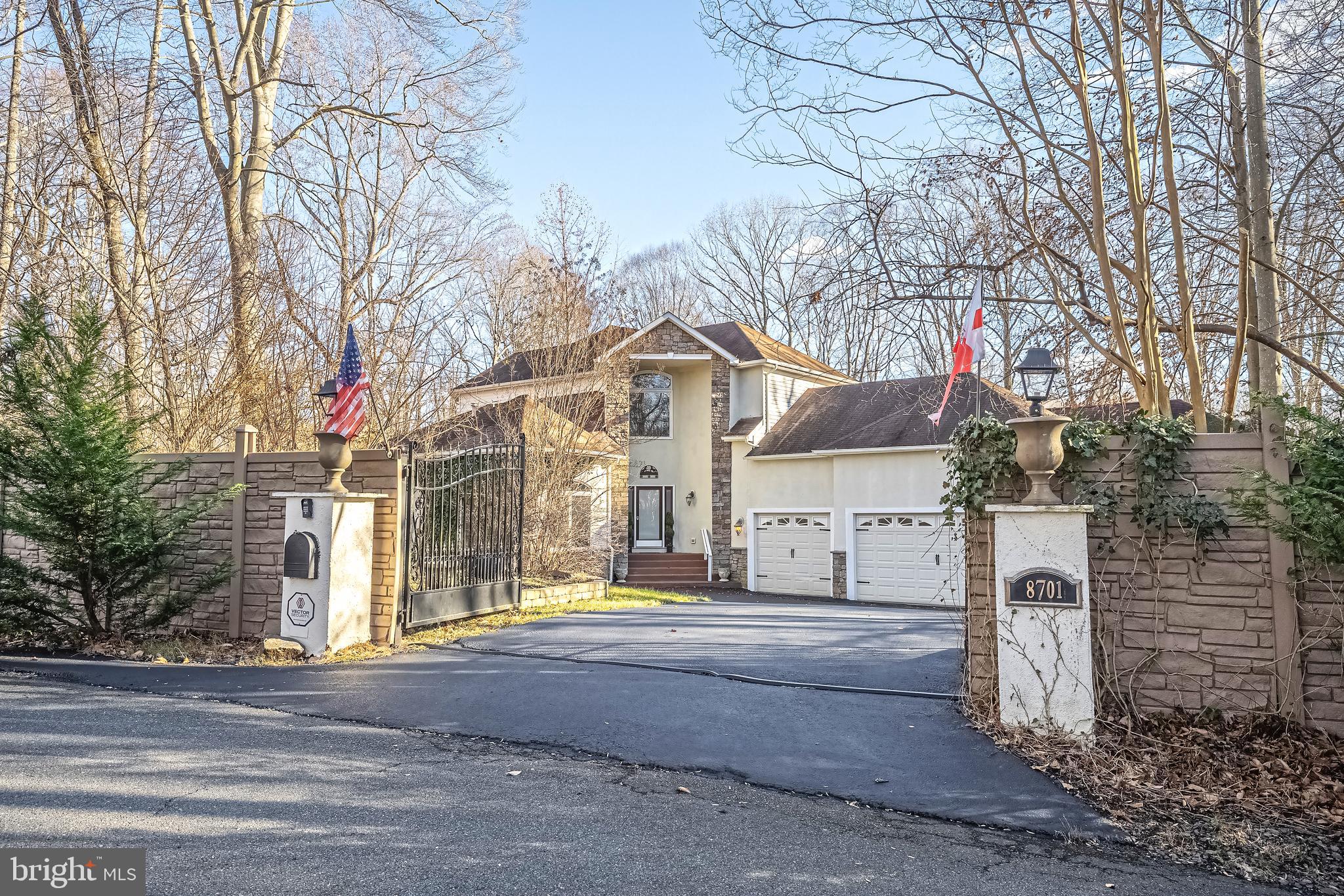 Coles District house with 5,300 finished square feet of living space, including 5 bedrooms, 4 full bathrooms, and 2 half baths on 9.8 serene, wooded acres. As the last house on the street, you will enjoy the peace and lack of traffic. Situated conveniently off Route 234 between Rt. 66 and Rt. 95 with easy access to both. The house includes both main level and upper level primary bedroom suites, two additional main-level bedrooms, and one in the basement. Kitchen boasts stainless steel appliances, granite counters, and a breakfast nook. Wood stove in the rear family room adds warmth throughout the main level. Attached 4-car garage will accommodate full size trucks. The backyard includes pool, hot tub, and covered veranda with an outdoor kitchen. Lot includes 2 acres of fenced pasture and 3 stall horse barn with automatic waterers and tack room. Whole house backup generator supplies essentials to both the house and barn. New roof and radon system installed in June!