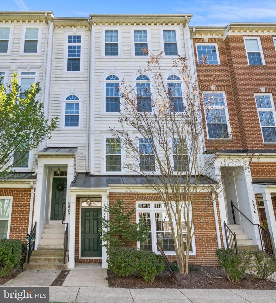 Welcome home to 42260 Black Rock Terrace in the sought-after Amber Spring Condominiums at Stone Ridge! • Beautifully updated 2-Bedroom, 2.5-Bath condo on two levels offering a modern open layout • Attached 1-car garage with access to incredible community amenities in the heart of Aldie.
• OPEN MAIN LEVEL LIVING: Bright and airy open floor plan with soaring ceilings, fresh paint throughout, and hardwood flooring across the main level—perfect for both everyday living and entertaining.
• LIVING & DINING AREA: Spacious combined living and dining space featuring a cozy gas fireplace and abundant natural light.
• KITCHEN: Well-appointed kitchen with a large island: Dishwasher, New Stove (2026), New Refrigerator (2026), & Ample cabinet, prep space and a dedicated pantry.
• MAIN LEVEL CONVENIENCE: Powder room and direct access to the attached 1-car garage just off the kitchen.
• UPPER LEVEL DEN: Versatile den ideal for a home office, reading nook, or additional living space, with direct access to a HUGE private balcony.
• PRIMARY SUITE: Generously sized bedroom with multiple windows, great natural light, ample closet space, and an ensuite bath featuring a dual-sink vanity and soaking tub/shower combination.
• SECOND BEDROOM: Spacious secondary bedroom with excellent closet space.
• HALL BATH & LAUNDRY: Full hall bathroom with tub/shower combo and convenient upper-level laundry.
• FRESH UPDATES: New Windows (2024), brand new carpet on the upper level, and fresh paint throughout for a move-in-ready feel.
• COMMUNITY AMENITIES: Enjoy access to a Community center, Fitness center, Outdoor pool, Tennis courts, Walking/jogging paths, and Tot lots/playgrounds.
• CONDO FEE INCLUDES: Water, sewer, trash, and snow removal for easy, low-maintenance living.
• PRIME LOCATION: Ideally located near major commuter routes, including Rt 50, Rt 15, and Loudoun County Parkway, with easy access to shopping, dining, and everyday conveniences. Close to Stone Ridge Village Center, South Riding Market Square, parks, Dulles International Airport, and more •  Love where you live!  •