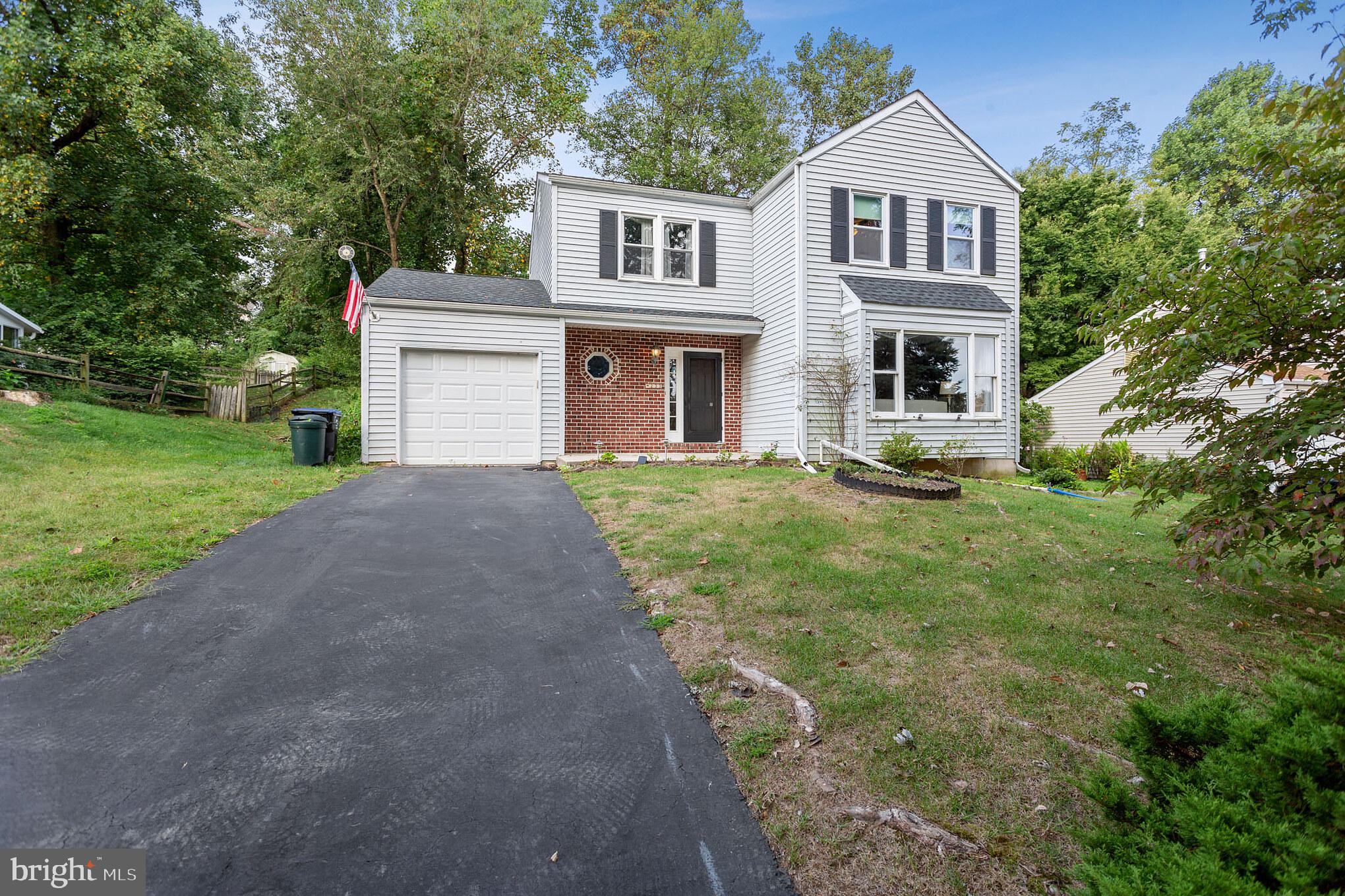 Welcome home to 233 Bridge Road in desirable Naamans Woods. This fabulous 3 bedroom, 2.5 bath home offers 1,852 square feet of living space and is move-in ready. You will be welcomed by a covered front porch and enter into a large foyer with tile floors. The focal point of the incredibly spacious and sun-filled living room is a gas fireplace with wood mantle. Beautiful hardwood floors in the living room flow seamlessly to the dining room. An eat-in-kitchen includes stainless steel appliances, gas cooking, oak cabinets, breakfast bar, ceiling fan and wonderful views of the backyard with mature trees. There is an enormous amount of closet space on this level. A powder bathroom completes the main floor. Upstairs is a Master Bedroom with en-suite and walk-in closet. There are two additional good sized bedrooms which share a hall bathroom. The unfinished basement is ideal for storage and is home to the laundry area. The possibilities for the basement are endless- gym, office, theater, man-cave and more! Close to 95 and 495.